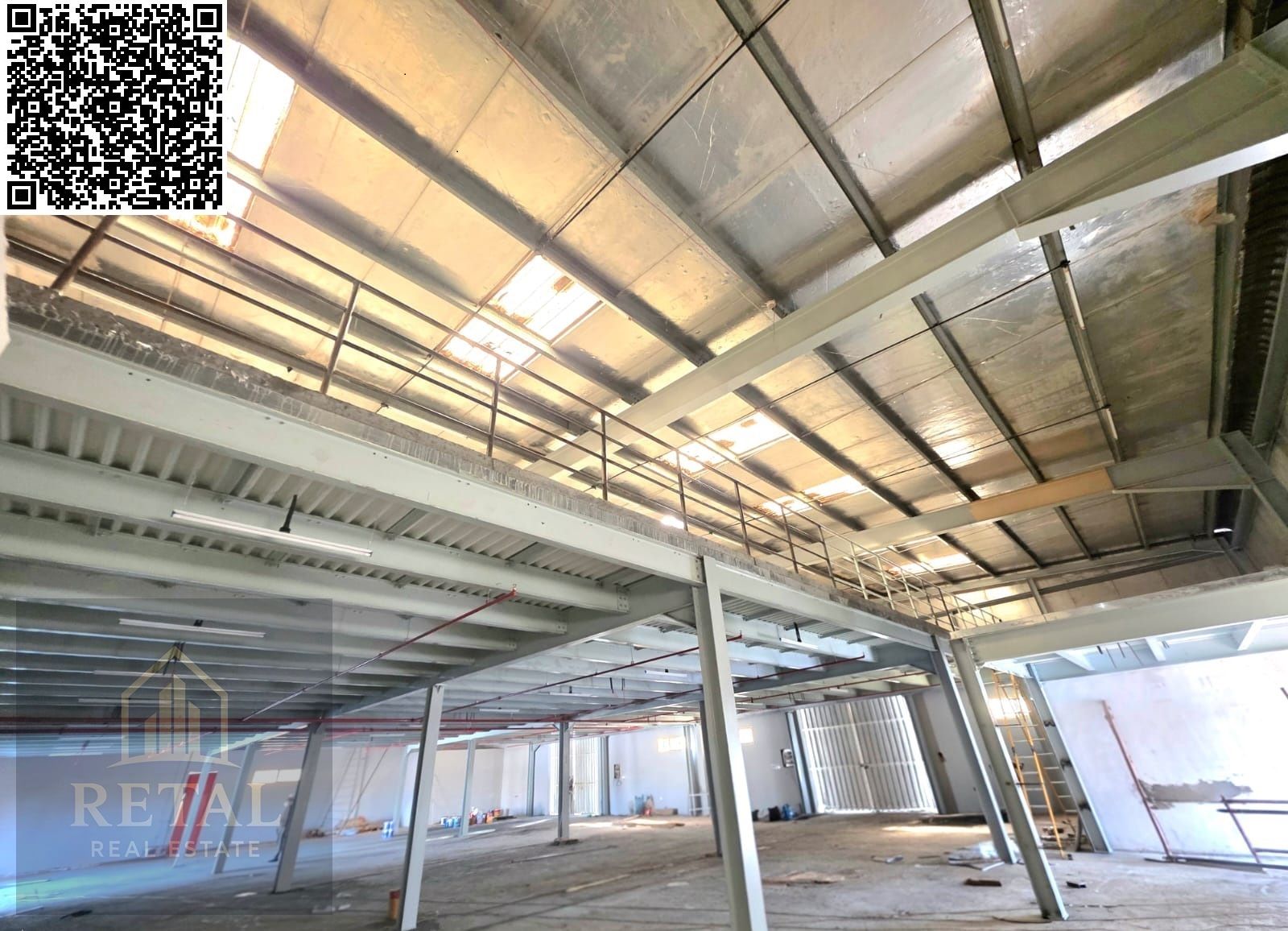 Mezzanine, main street, in front of it a large yard for truck parking and easy loading and unloading.