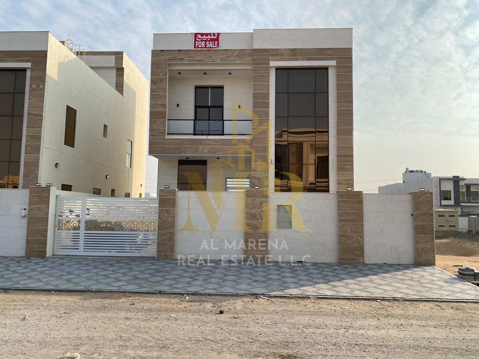 Near the mall in Yasmeen, 2-floor + roof villa, 7 master bedrooms, price includes electricity, water & AC, prime location, ready to move in.