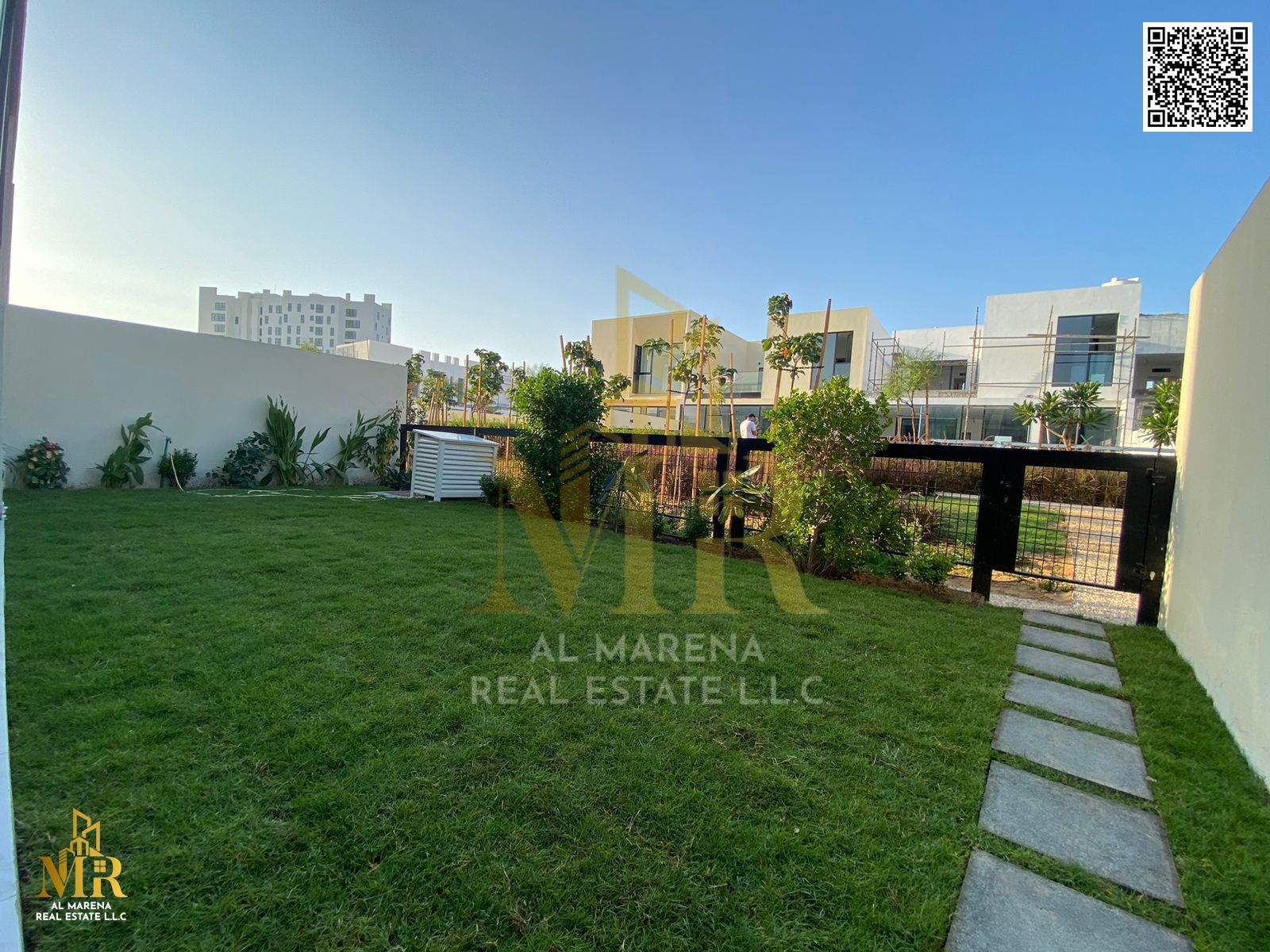 For rent in Al Zouraa, villa with 4 master bedrooms and a garden, prime location with partial golf views, offering a serene and luxurious living exper