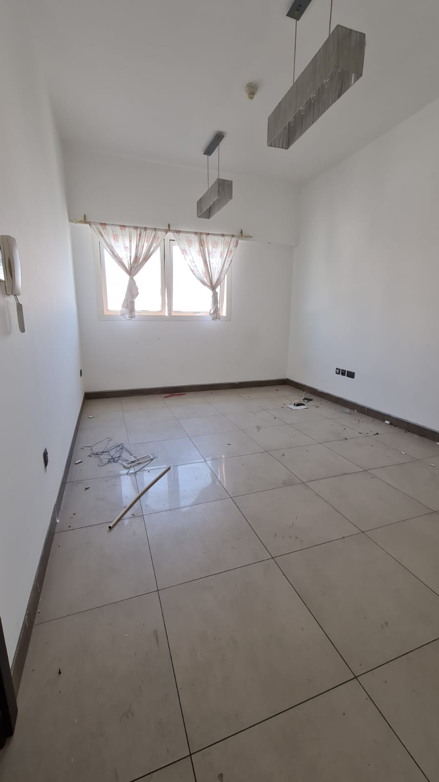 One bedroom and living room with central AC, free gym and pool. Family apartment in Al Qasimia, Sharjah, near Dubai exit and all services.