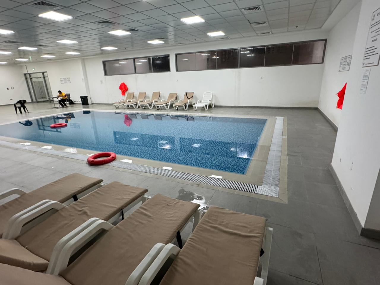 Beautiful furnished 1BHK for annual rent in Rashidiya 1 (Gulfa Tower), gym & pool, balcony, 2 baths, central AC, easy payment.