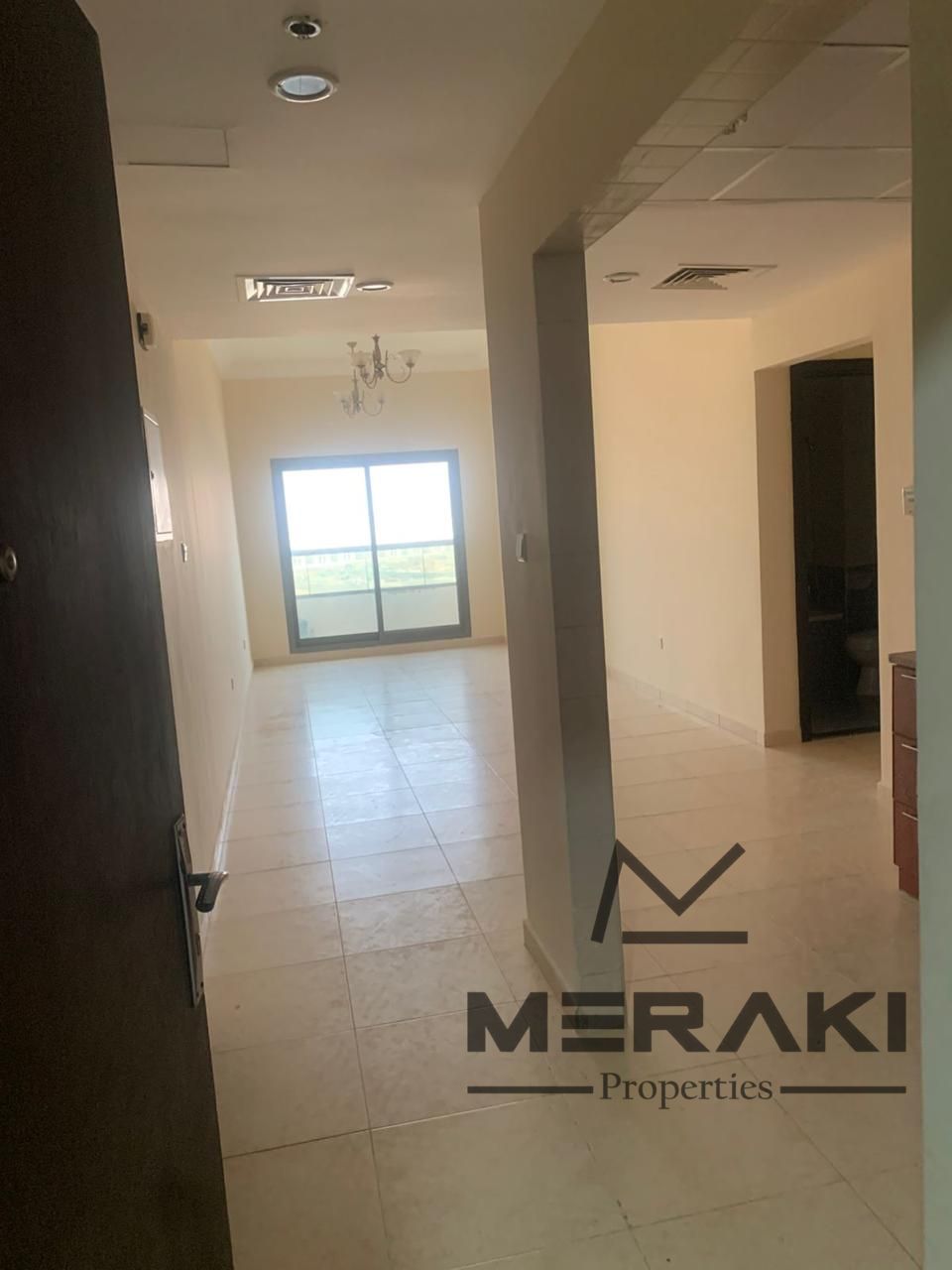 A one-bedroom apartment with a living room at a special price, also featuring an open view of Mohammed Bin Zayed, and it also with a private parking