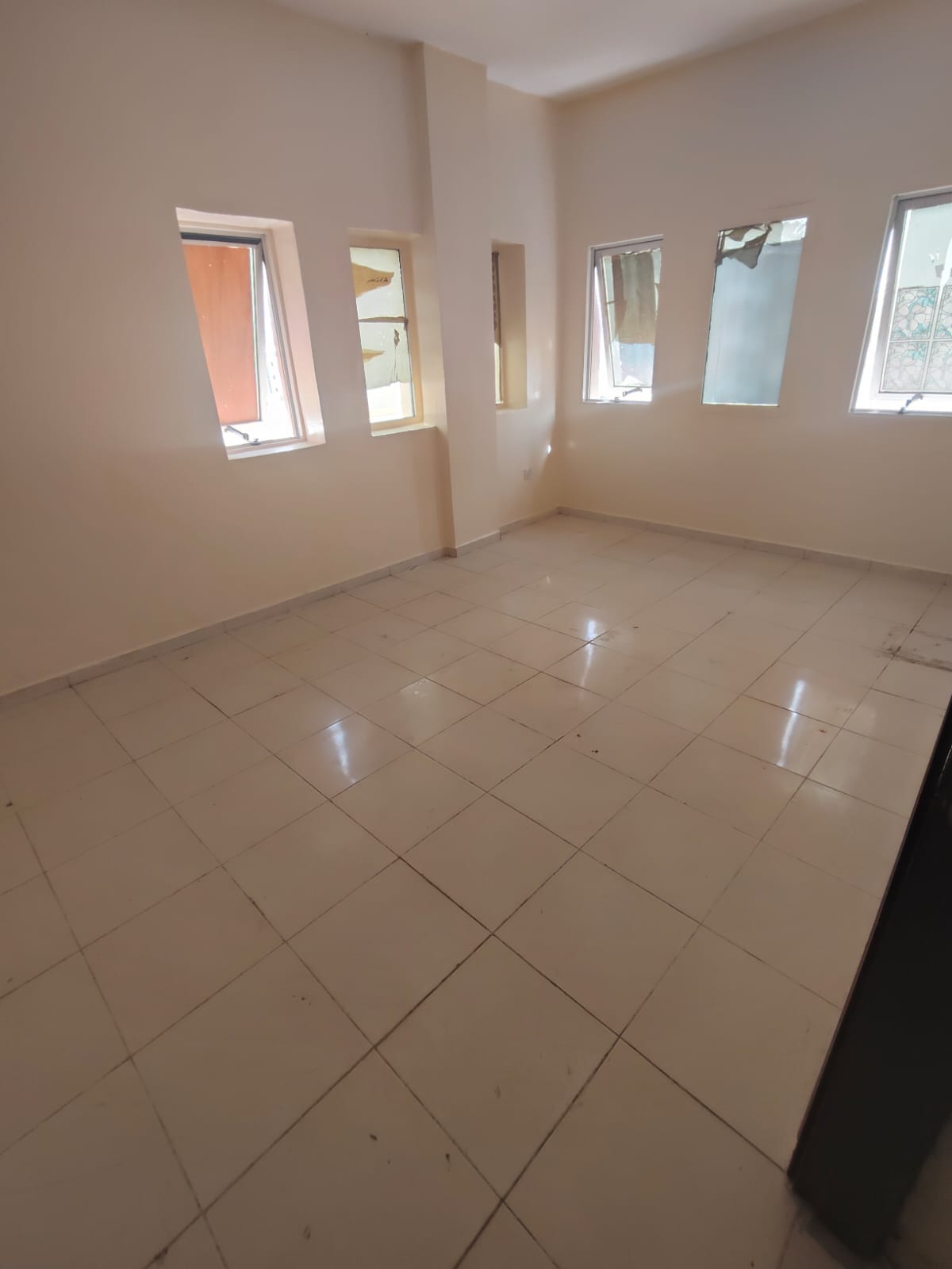 For annual rent in Sharjah, specifically in the Al Naba'a area: a one-bedroom apartment with a living room, offering excellent space.