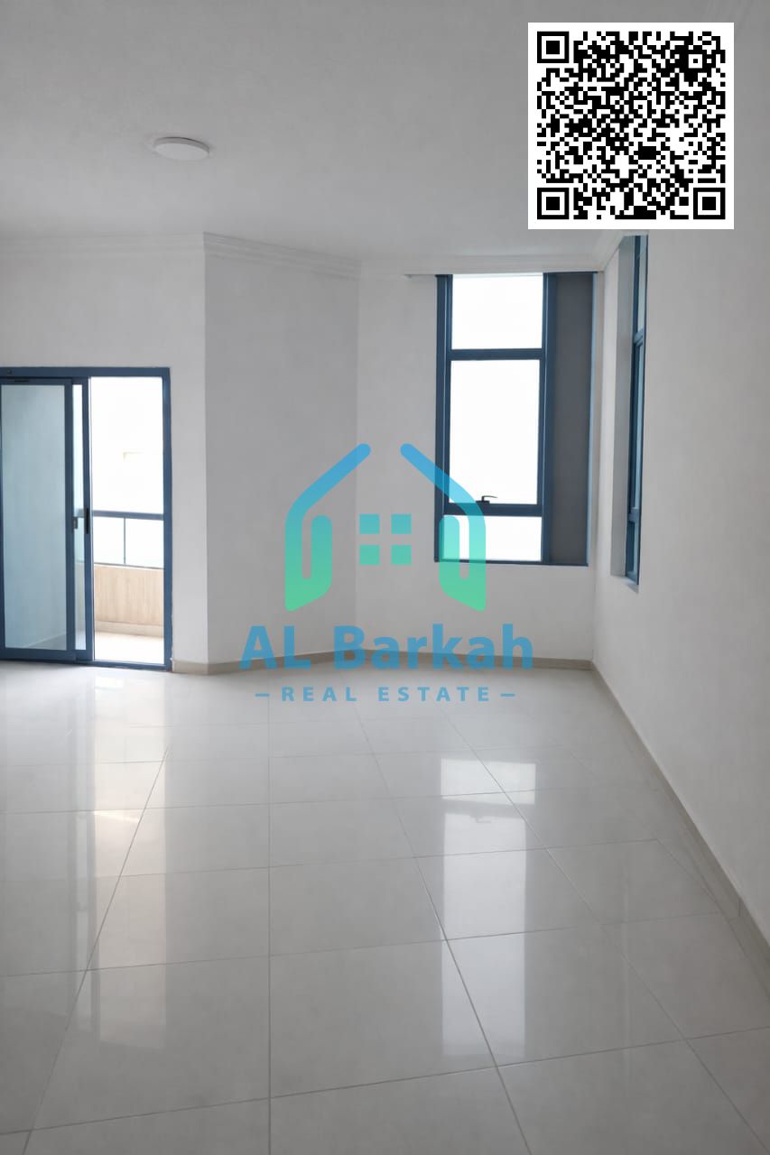 A luxurious apartment for sale in Al Khor Towers, featuring a prime location and a stunning view. It includes two bedrooms, a spacious living room, hi