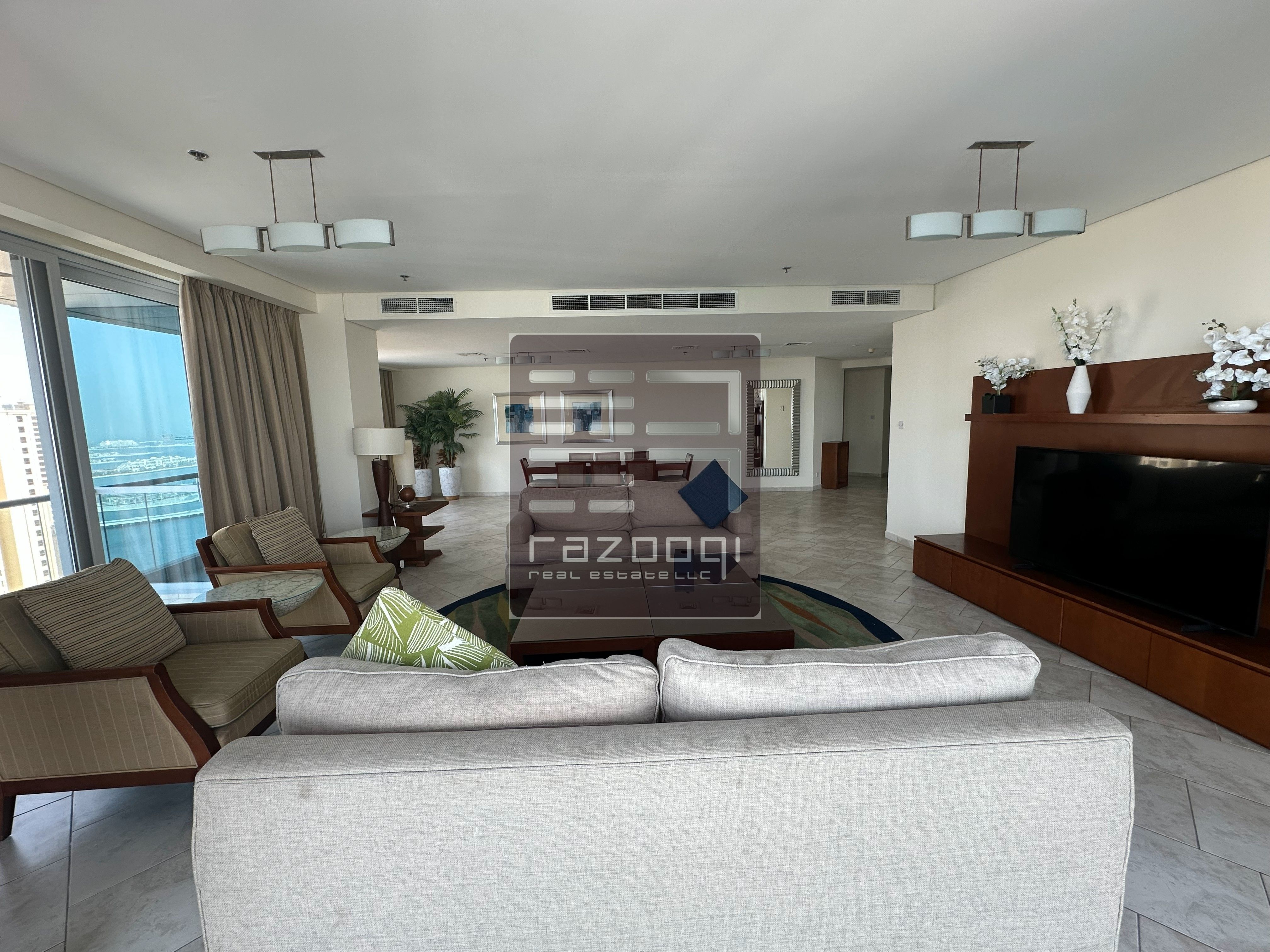 Luxurious Family Living: 4BR Apartment at Oasis Beach Tower