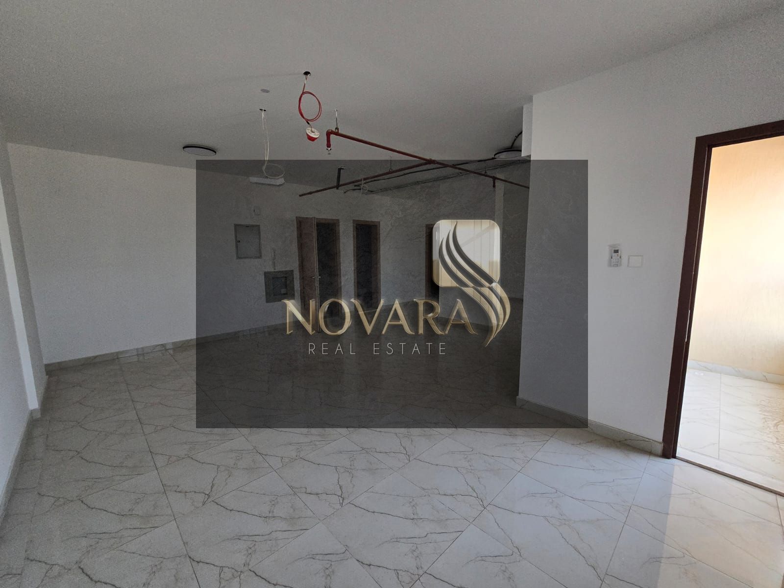 Brand new office for rent, first use, in a strategic location in Al Jurf Industrial Area 2