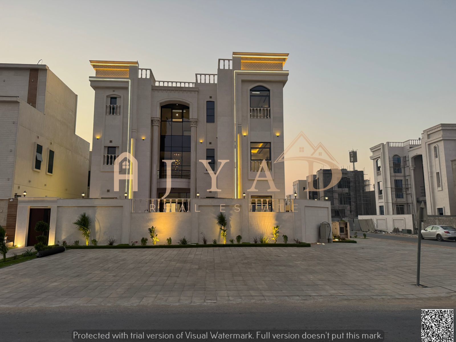 Luxury villa for sale in Ajman, Al Zahiyah area. Corner villa on two streets, three floors with a 12-meter setback in front. Price includes registrati