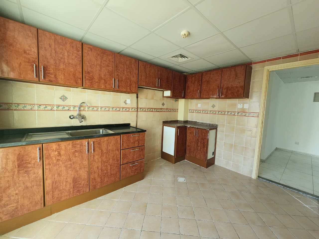 Spacious two-bedroom apartment with balcony in Al Qasimia Al Nad, large living area, two bathrooms, close to all services.
