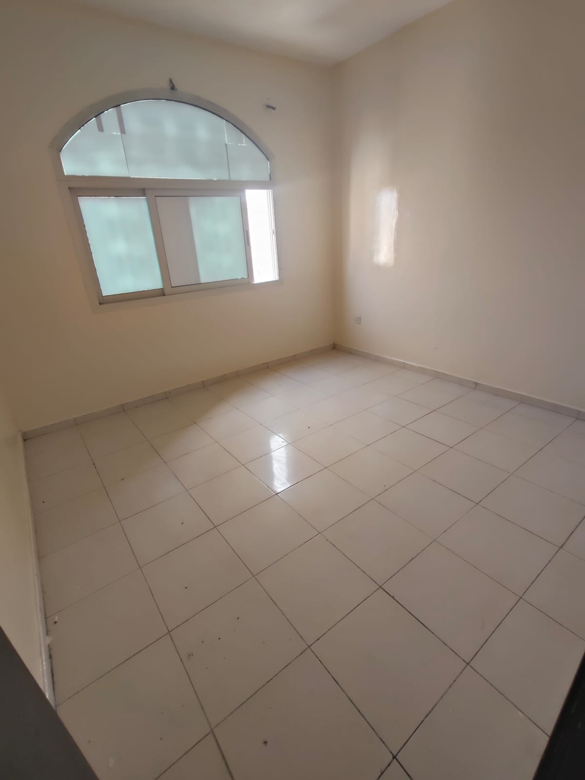 A room with a living area, central air conditioning, spacious, separate kitchen, balcony, payment facilities, affordable price.