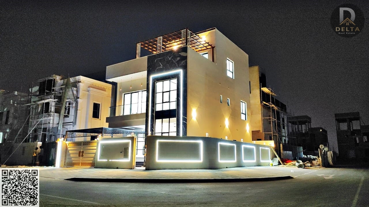 A villa with a European design, featuring prominent glass windows and black stone, giving it a stunning appearance. Ideal for those seeking modern liv