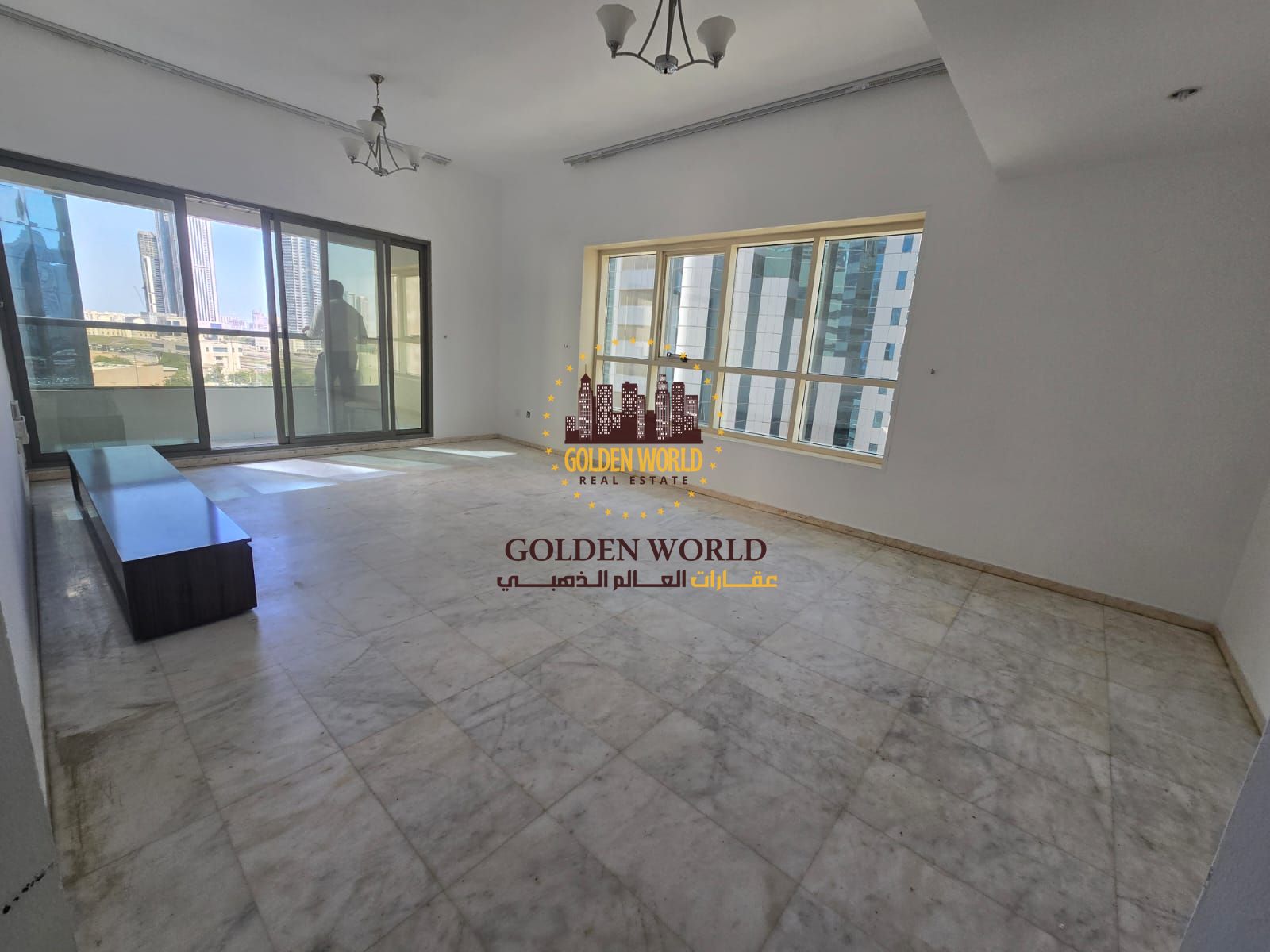 A wonderful apartment in Al Taawun with two bedrooms and a living room with a balcony. Very bright, featuring a master bedroom, two bathrooms, built-i