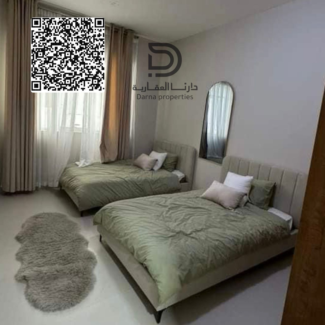 A spacious 2-bedroom apartment for sale in Al Ameera Village – Phase 3, Building B2 – mid-floor with direct street view, close to 100% handover, gener