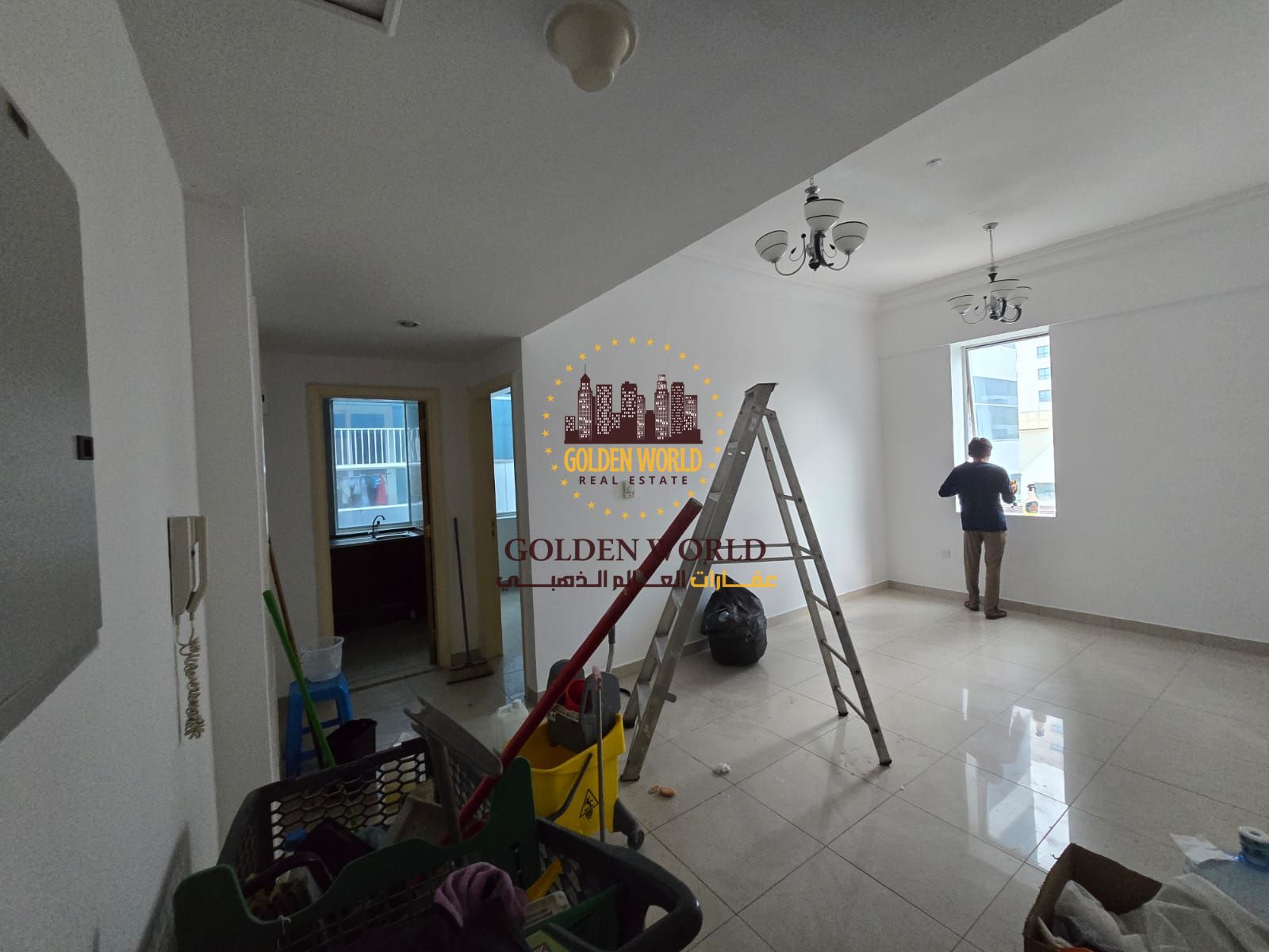 One-bedroom apartment with a living room in Al Nayli Complex, Al Taawun Street, 1 bathroom, prime location close to services. Rent: AED 38,000 per yea