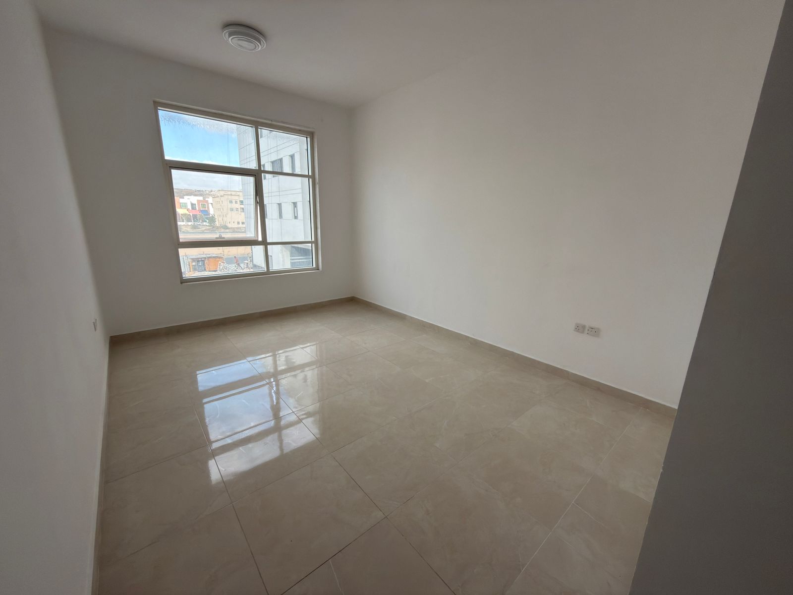 33,000 AED Annual Rent – 1 Bedroom Apartment with Living Room, Second Tenant Al Jurf 3 – Ajman Close to China Mall, in a brand new building, featu