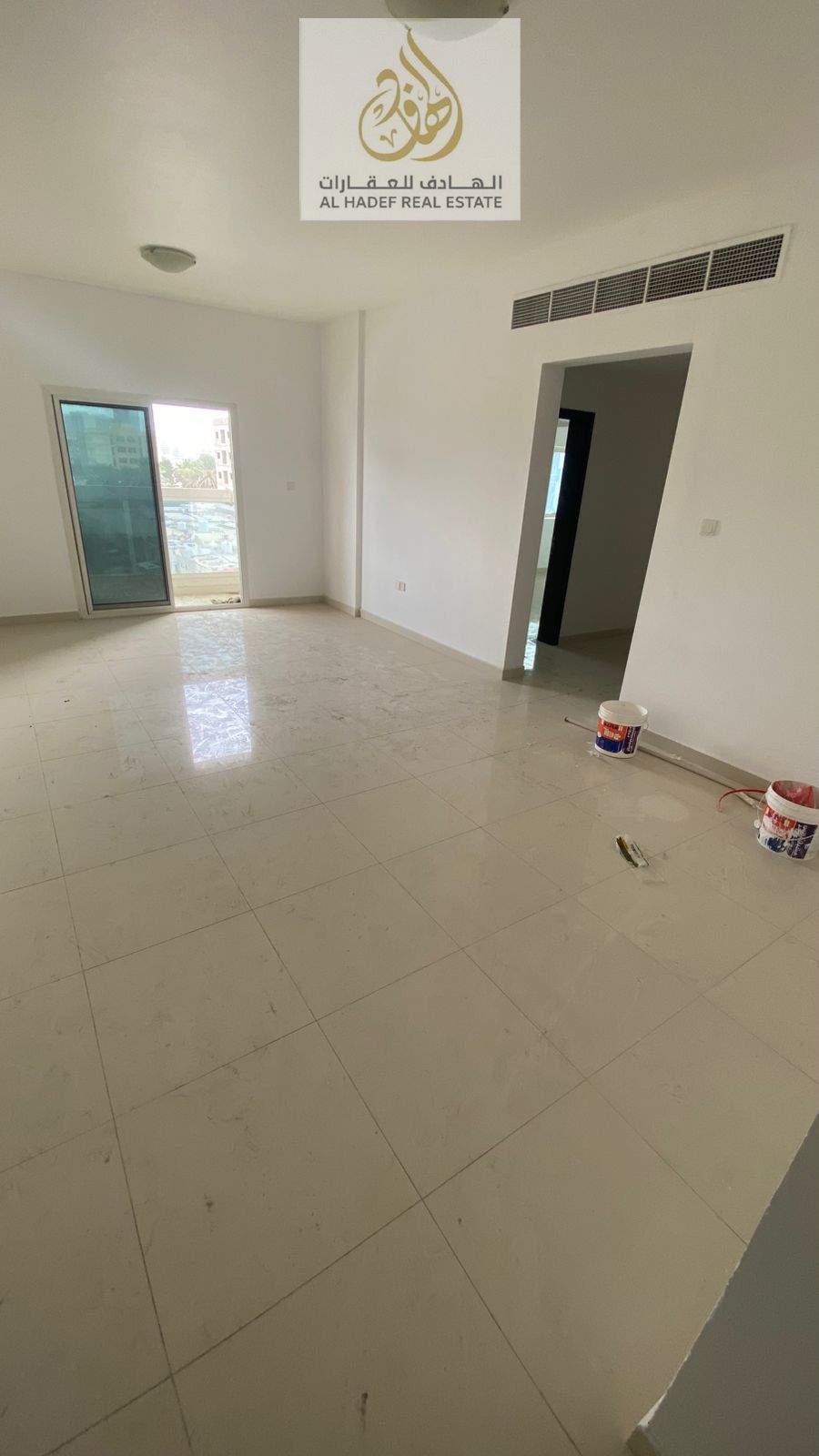 Two bedrooms and a living room with two bathrooms, a balcony, and built-in wardrobes. Price: 41,000 AED Four post-dated checks required Security depo