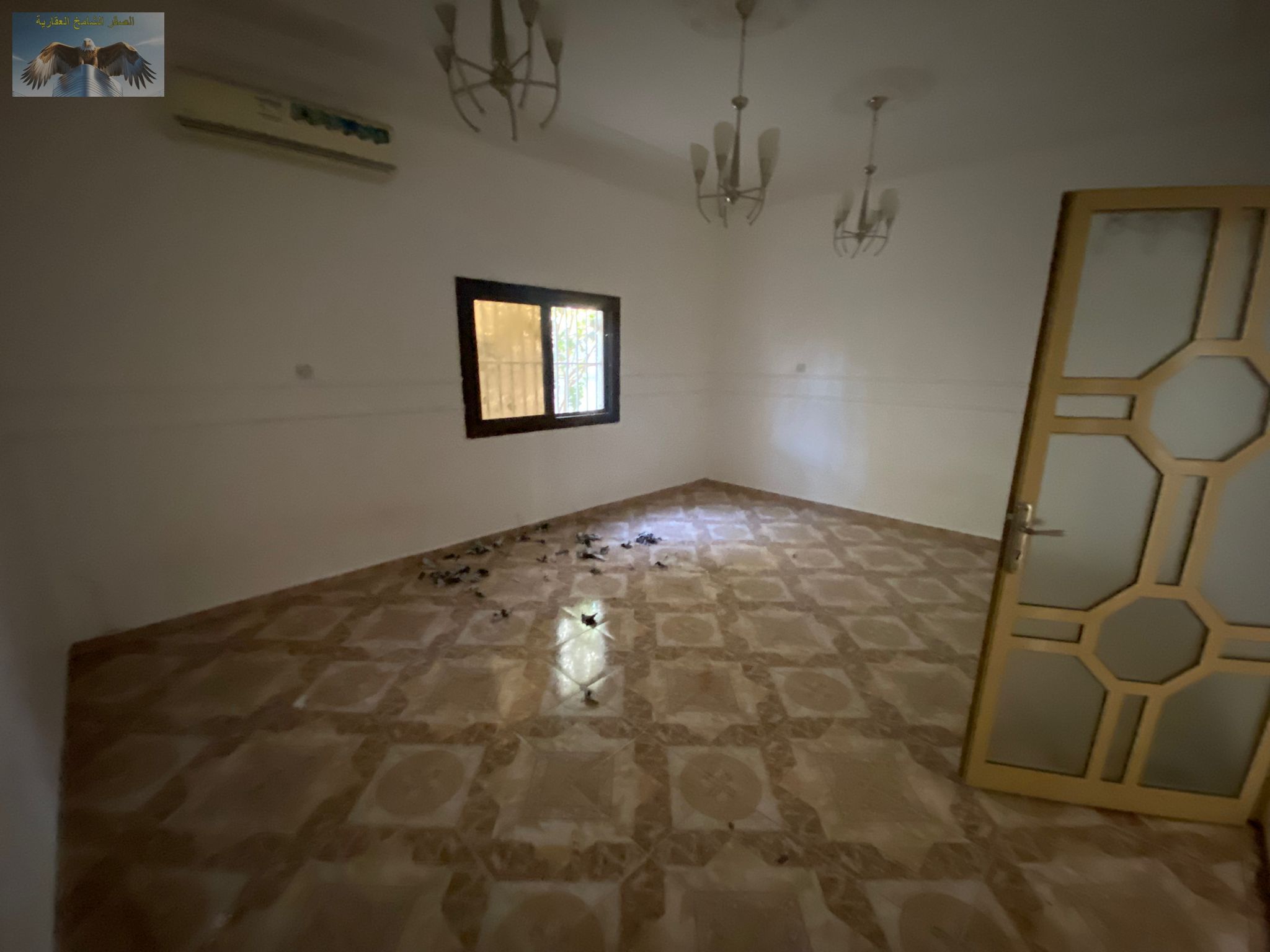 Ground floor villa for rent in Al Nuaimiya 1, opposite Al Ain Hotel and Markets, 3 bedrooms with AC, small yard, prime location