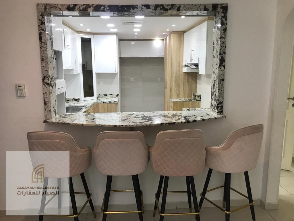 3-bedroom apartment with living room for sale in Al Majaz 3 – Al Qasba, Queen Tower, 1,650 sq. ft, with parking, service charges AED 7,000 only, final