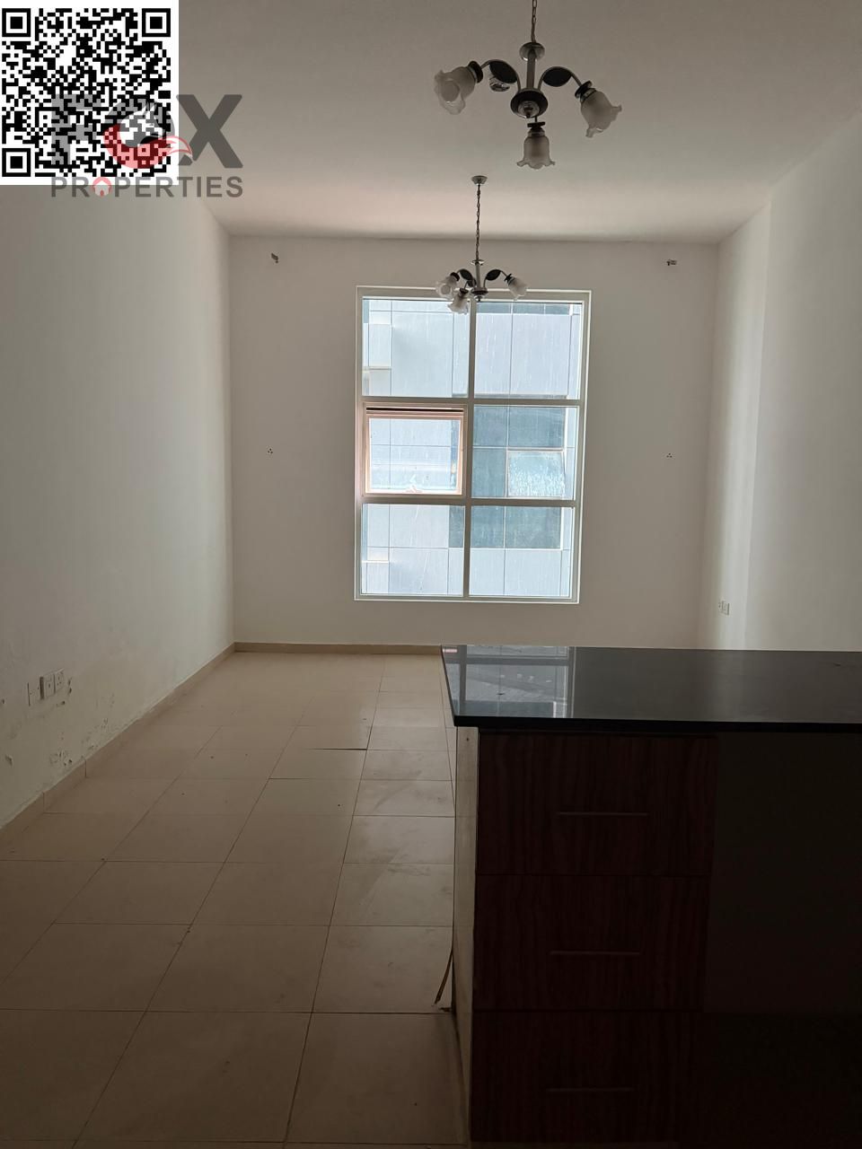 One bedroom and living room for rent in City Tower, Ajman, with private parking. Prime location and reasonable price.