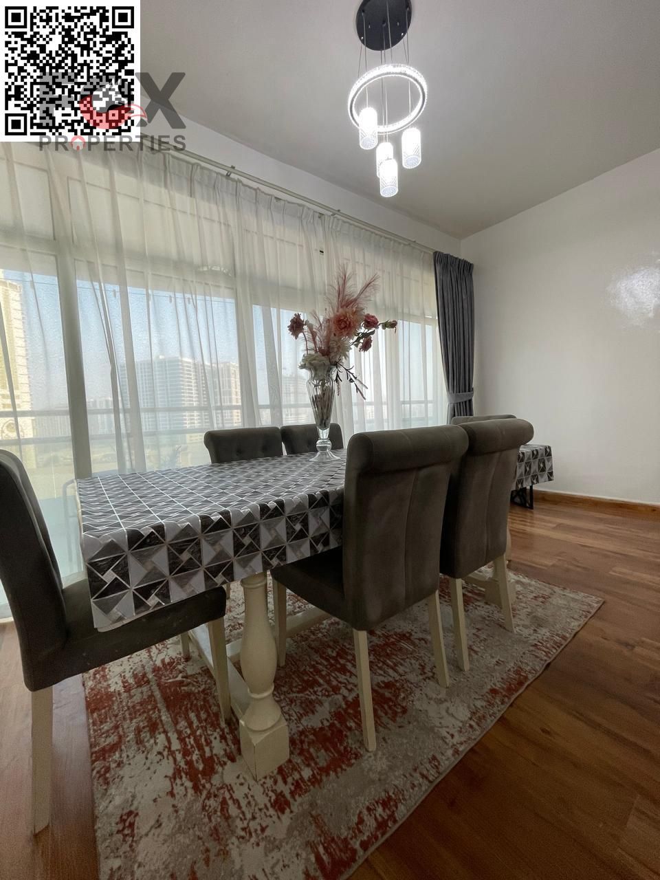 Two bedrooms and a living room for a mont rent in Al Rashidiya 1, Horizon Towers. Spacious areas, 3 bathrooms, open view, and a location close to Shei