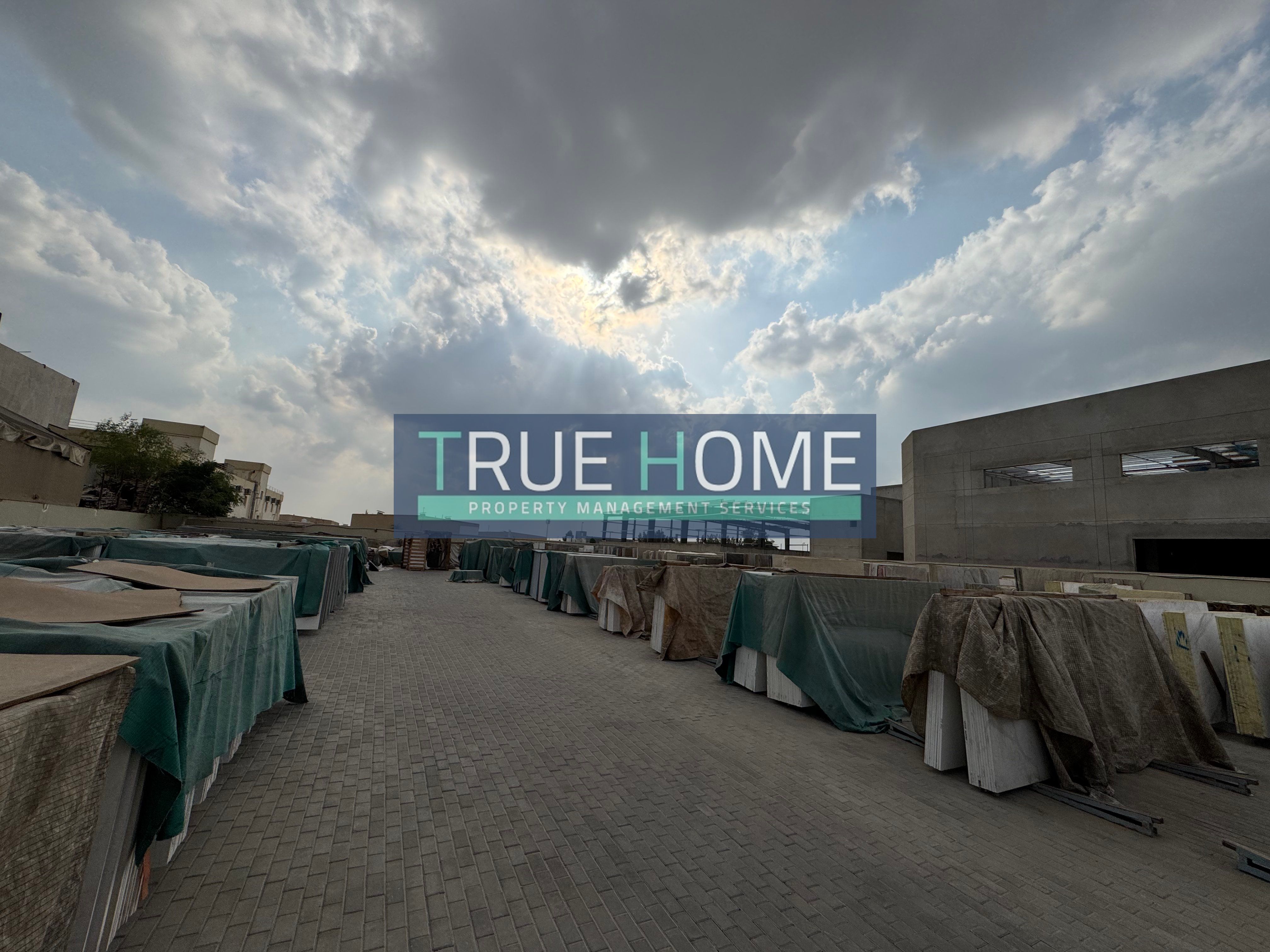 30,000 Sq. Ft. Industrial Yard with Power & Civil Defense | Al Sajaa