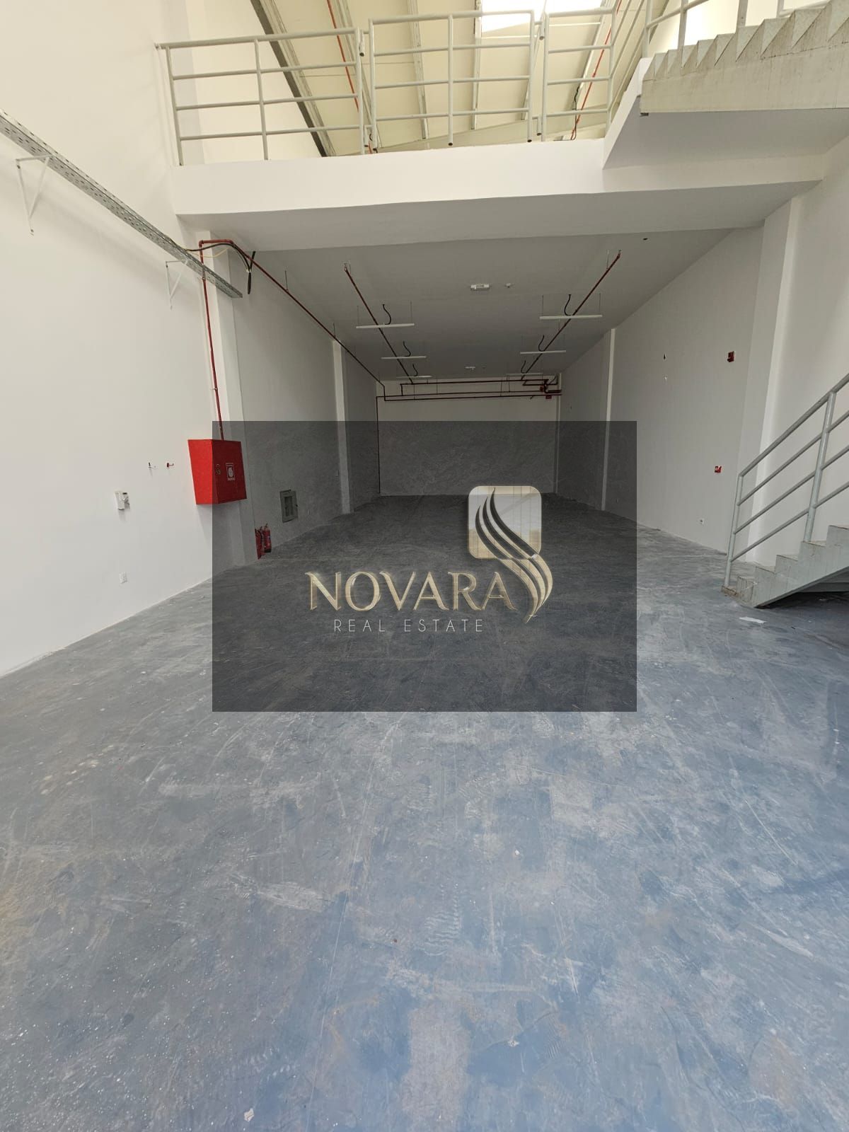 A distinctive warehouse in Al Jurf Industrial Area 3 on the main street, with an area of 3000 feet with a mezzanine, a height of 12 meters, electric