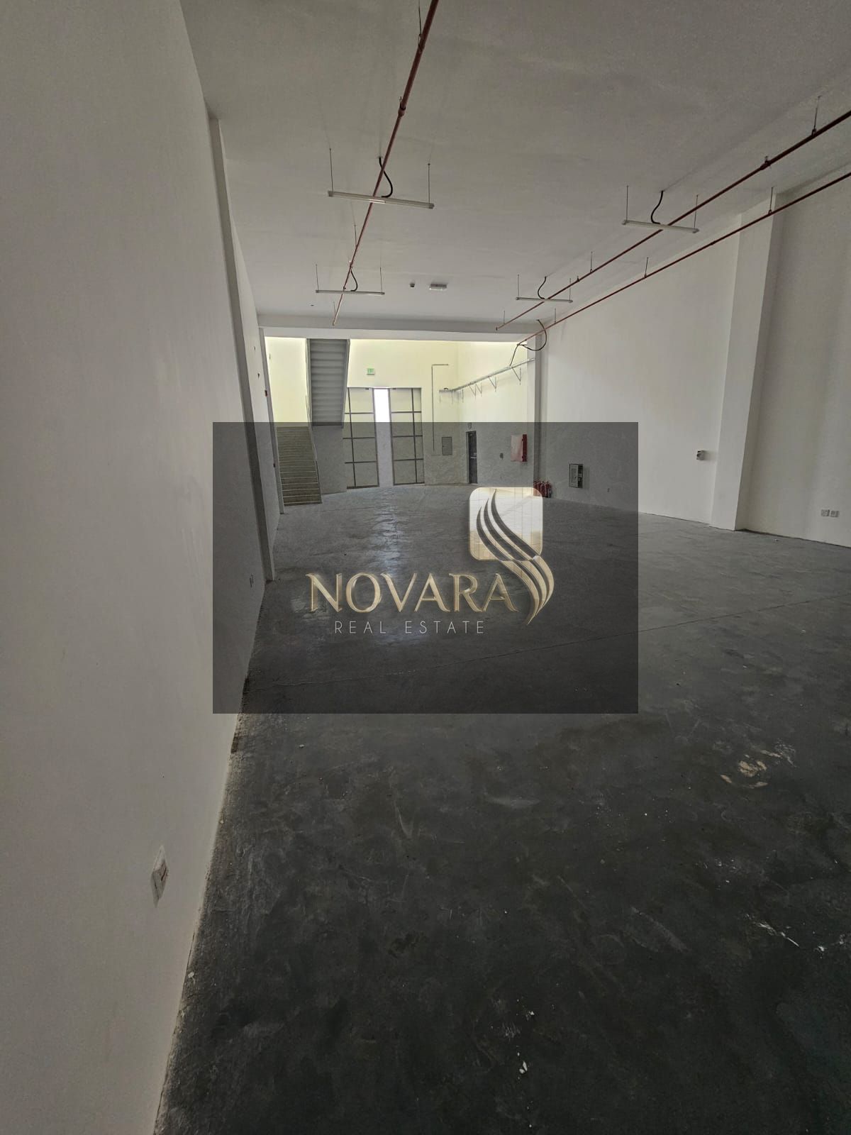 Ready-to-move-in warehouse for rent in Al Jurf Industrial Area 3, with an area of 3000 sq ft and high-power electricity (32 kW).