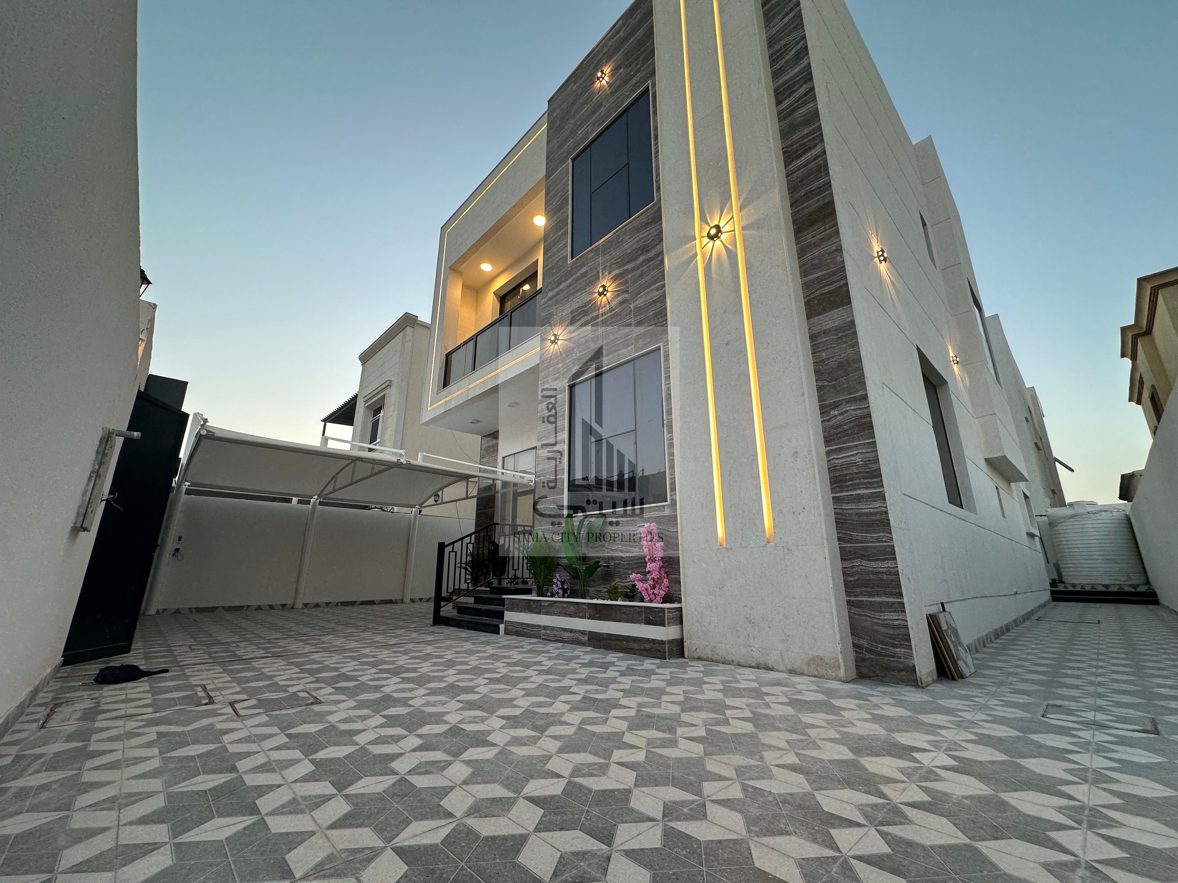 Freehold for all nationalities Luxury Modern Design Villa for Sale Al Zahiyah - Ajman On Sheikh Mohammed Bin Zayed Road Land Area 3014 sq m Built-up Area 2900 sq m Consisting of: - 3 Master Bedrooms - Majlis - Living Room - Large Main Kitchen -
