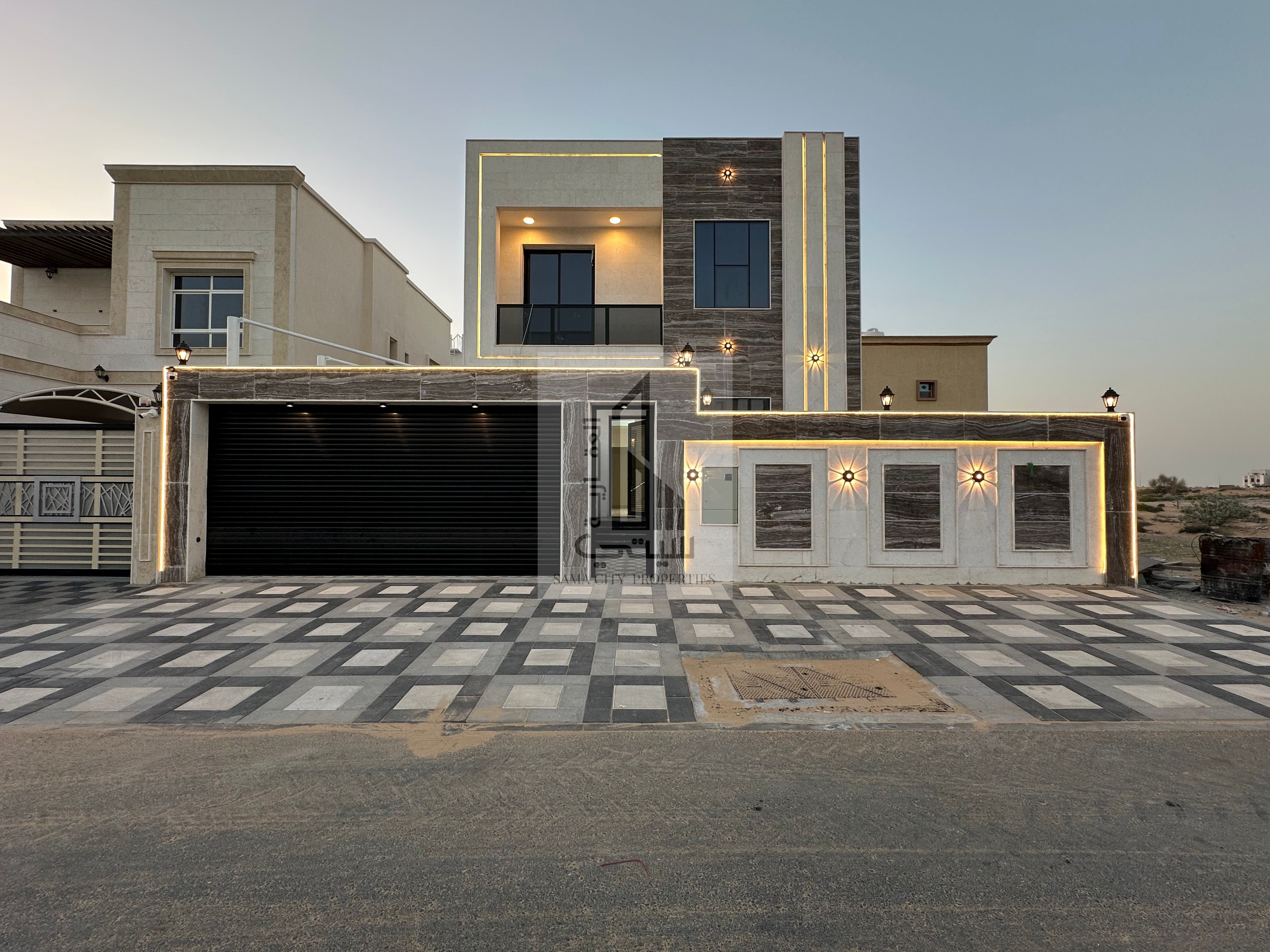 Freehold for all nationalities Luxury Modern Design Villa for Sale Al Zahiyah - Ajman On Sheikh Mohammed Bin Zayed Road Land Area 3014 sq m Built-up Area 2900 sq m Consisting of: - 3 Master Bedrooms - Majlis - Living Room - Large Main Kitchen -