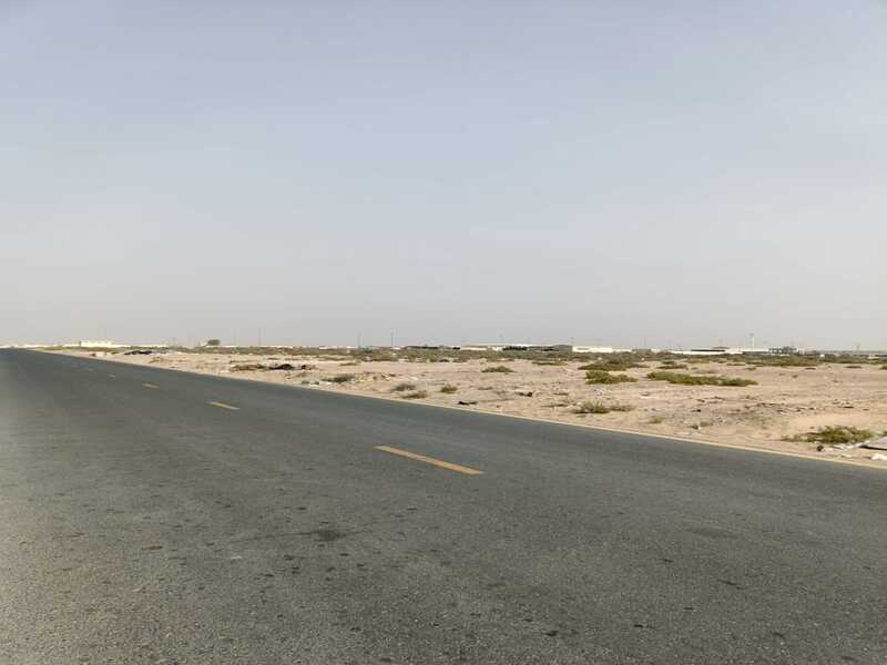 Land for sale in Al Sajaa area, 112,000 square feet, prime location