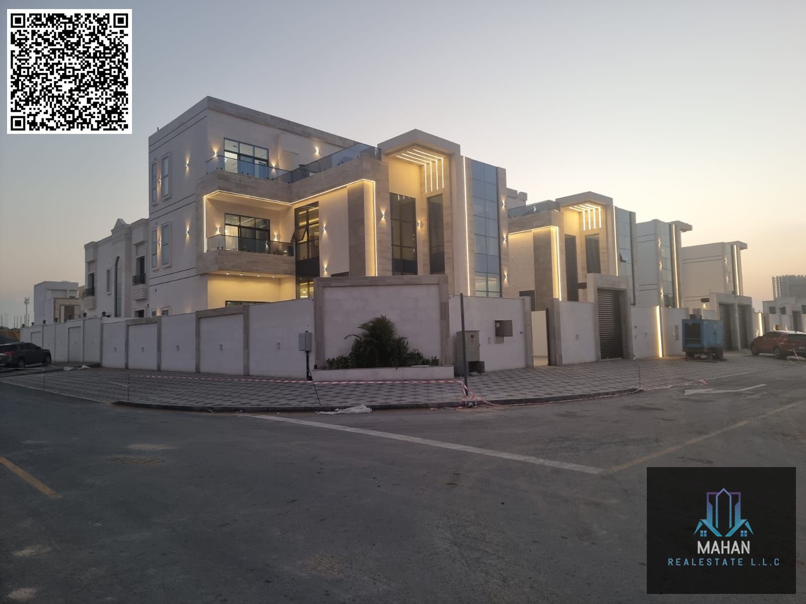 A luxurious villa situated on a corner lot, featuring a modern design, a swimming pool, and fully furnished with high-end finishes and a garden—all at