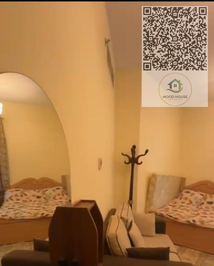 Apartment for Rent in Al Rashidiya 1 – Ajman Emirate, featuring a prime location on Mina Street overlooking Ajman Creek, close to the Corniche, and su