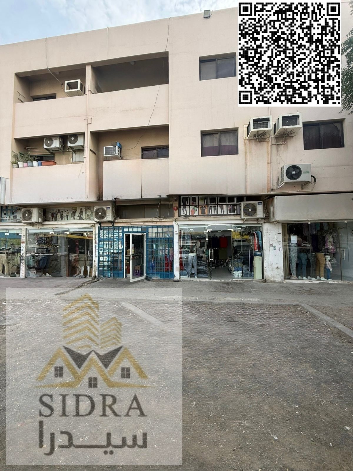 Prime Corner Residential & Commercial Building – 8,400 Sq. Ft | 10 Shops, 25 Apartments | AED 8M – High Income