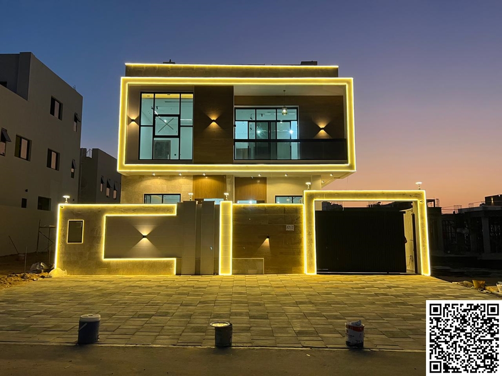 Modern villa for sale in Al Bahia area – Ajman. Excellent location on a main street. Two floors and a roof. Price includes registration fees. Land are