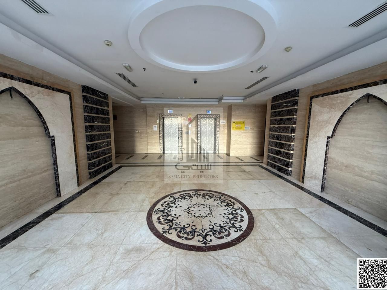 For rent: A luxurious and spacious apartment with two bedrooms, a living room, two bathrooms, a kitchen, and a balcony in Rawda 1, close to amenities.