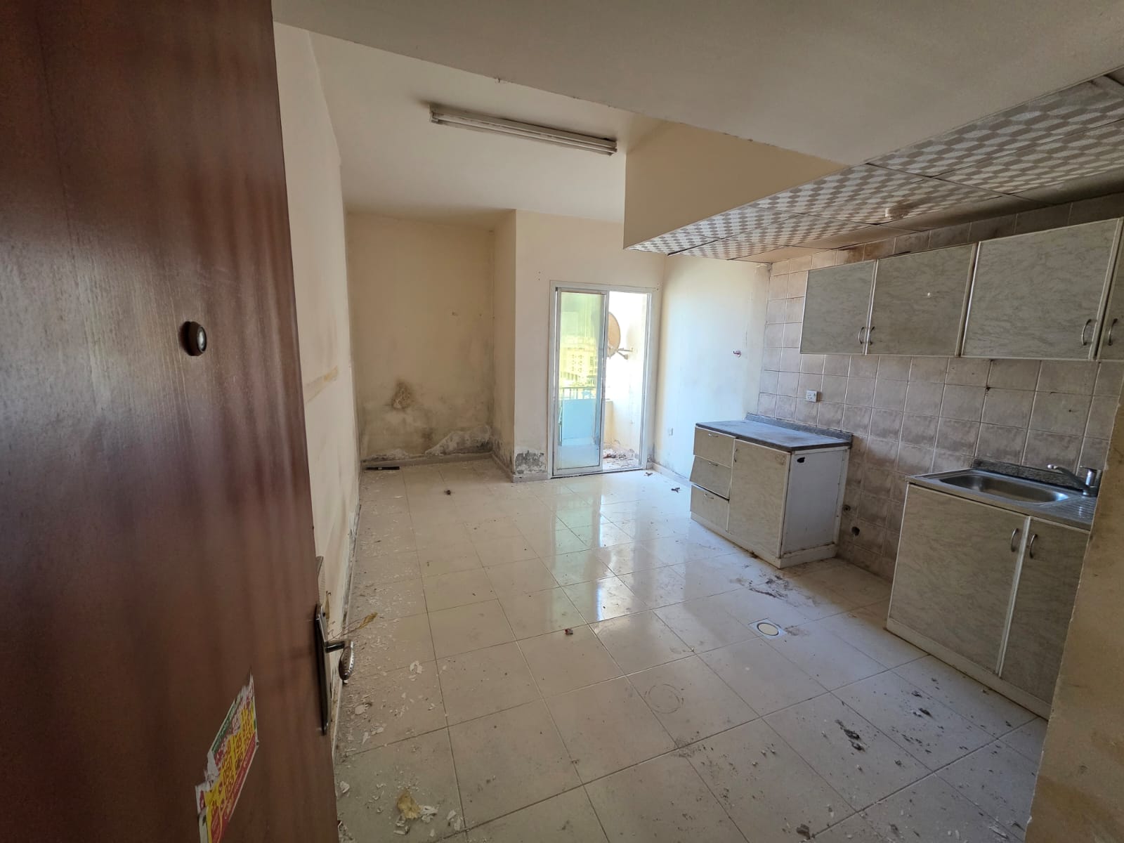 Studio apartment with balcony - excellent size - prime location - in Al Rawda