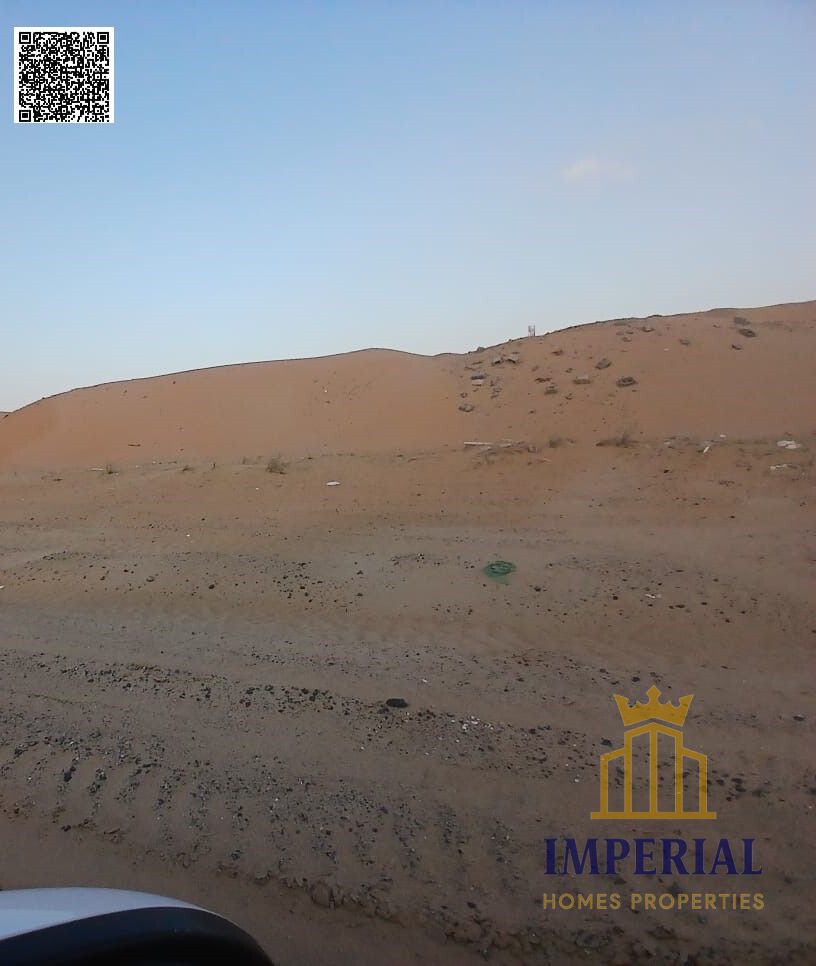 A prime commercial plot of land is for sale in Al Helio 2, Ajman. Strategically located directly opposite Azhi Mall,