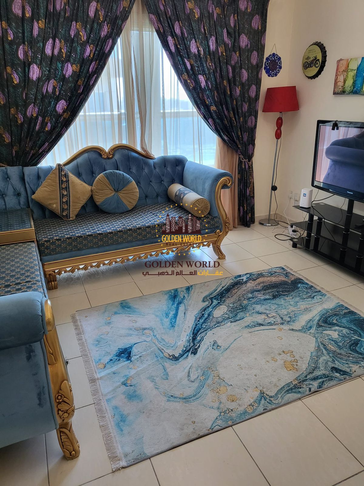 One-bedroom apartment with living room in Sharjah, full sea view, large furnished balcony, internet included, two bathrooms, close to services and tra