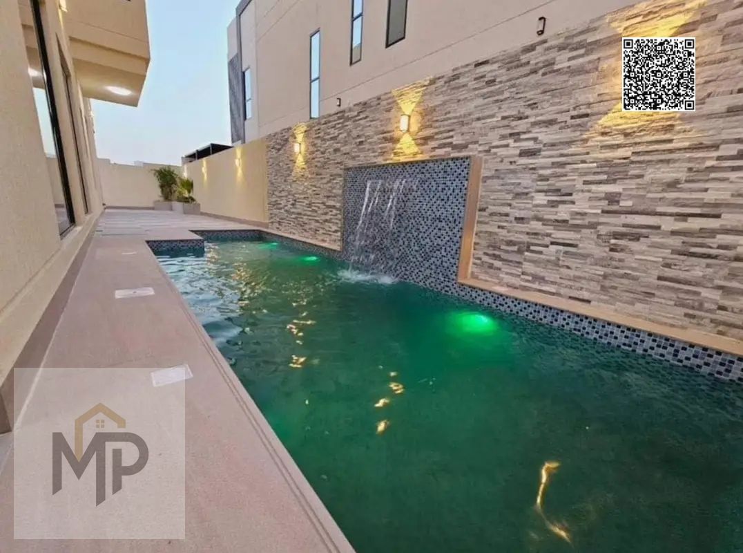 For sale, a two-story villa with a large courtyard - close to Sheikh Mohammed bin Zayed Road - freehold for all nationalities with the right of inheri