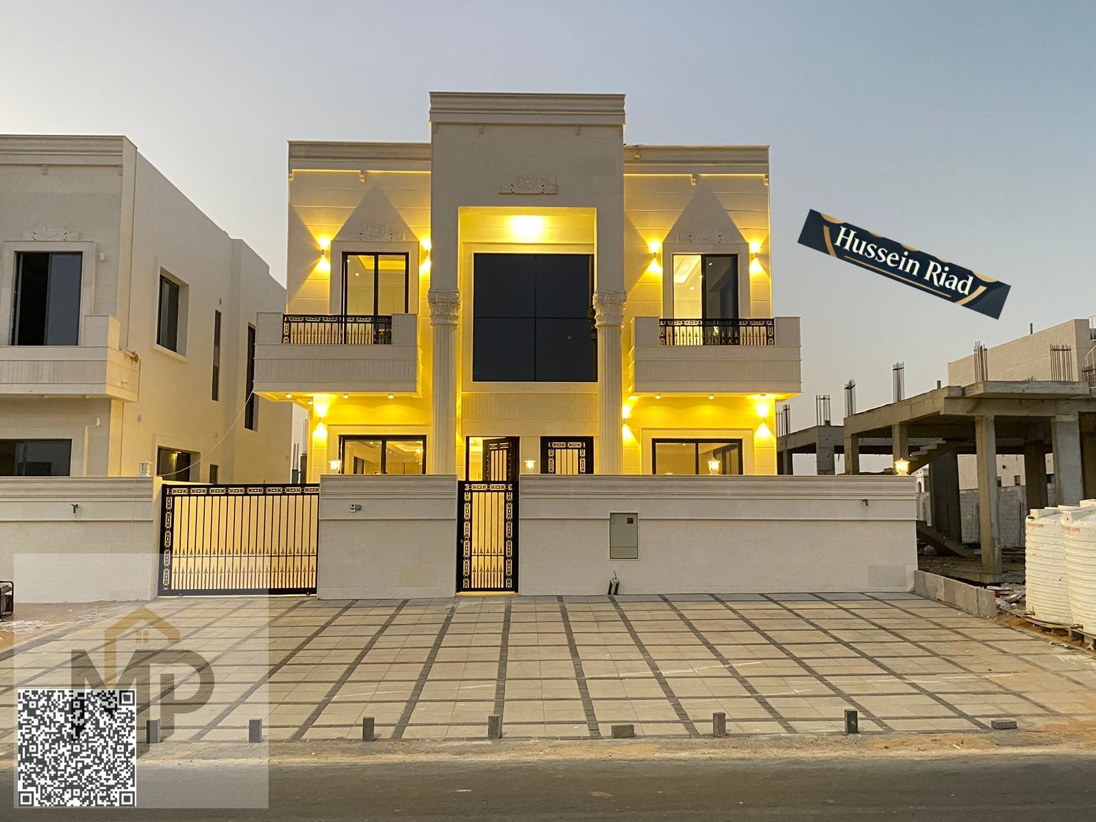 A luxurious villa with a classic design in a prime location in front of Azha Compound, with a price that includes registration and ownership fees.