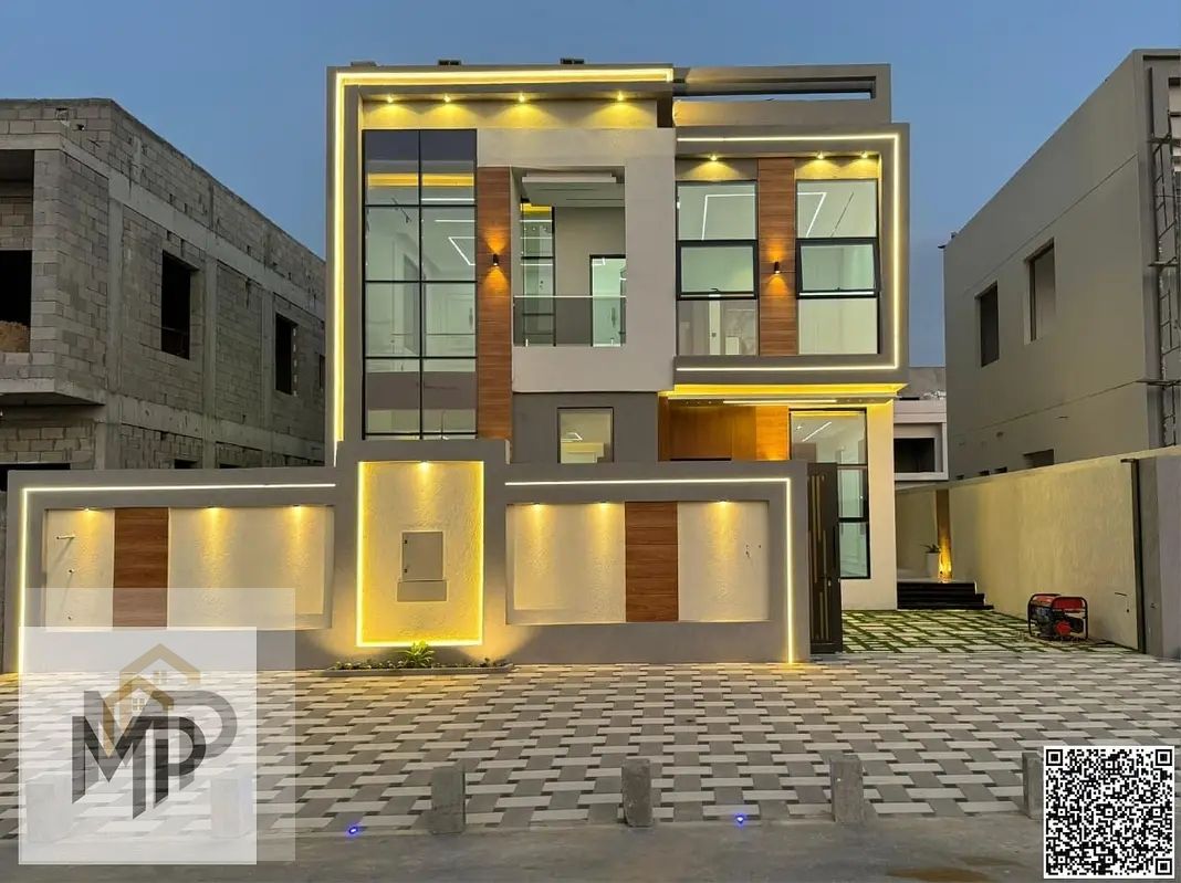 A villa at a price including registration and ownership fees on the main street, ready for occupancy in the most upscale areas of Ajman, freehold for