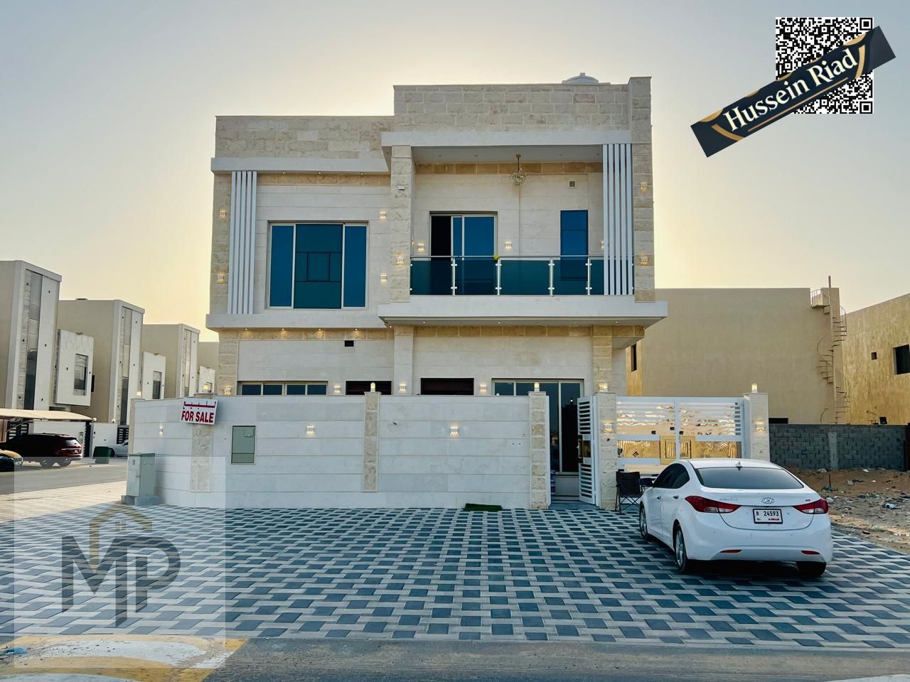 For sale - luxurious corner villa with stone finish and two facades | Elegant design and prime location in Ajman, including registration fees