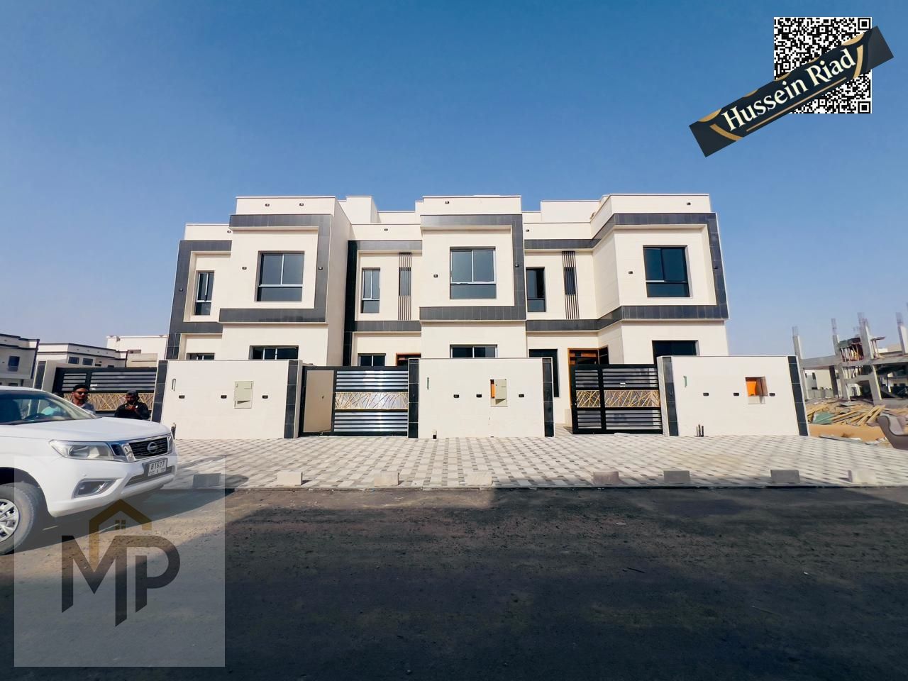 Villa in Al Helio 2 - Ajman, including registration fees, 4 master bedrooms with built-in wardrobes in a prime area in Al Helio