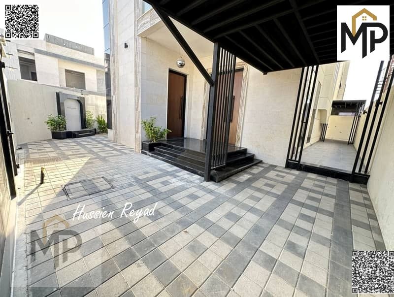 Villa for sale - two floors - with a spacious yard and a negotiable price - near Sheikh Mohammed Bin Zayed Road - freehold ownership for life for all