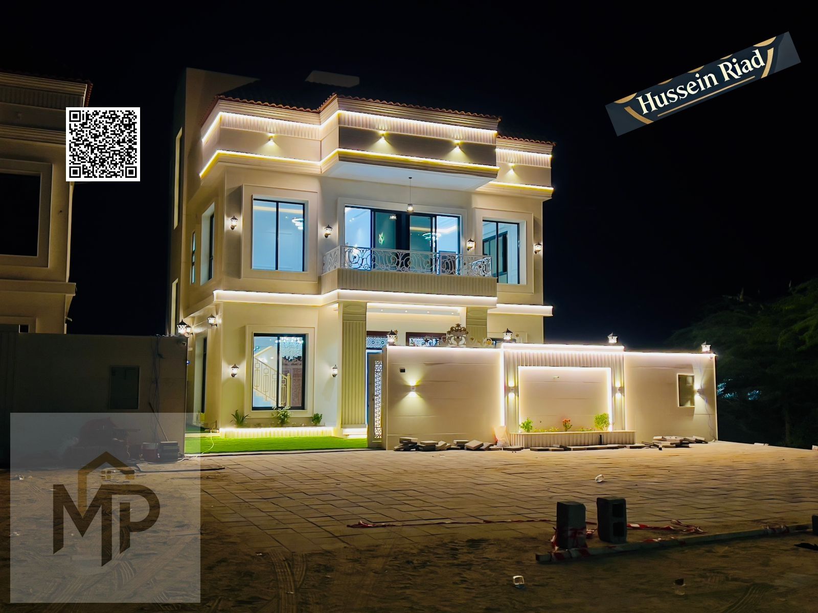 Own a miniature palace in a strategic location near Emirates Bypass Road, two floors and a roof, 5 master bedrooms, luxurious design, at a price that