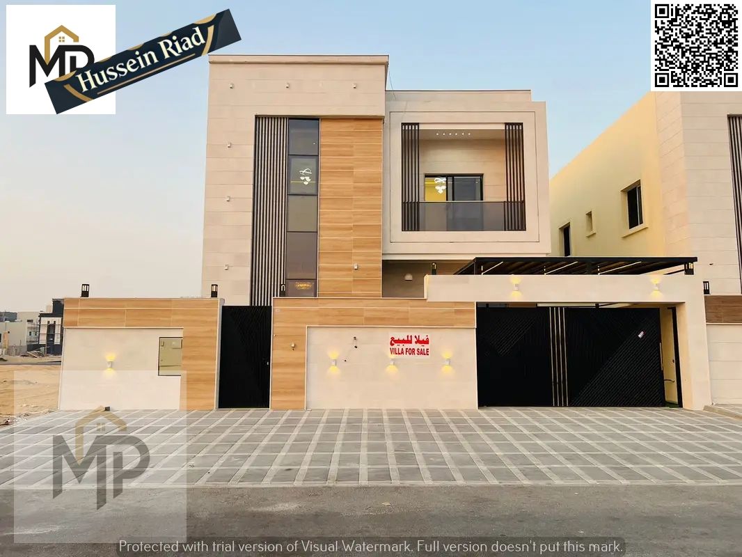 Two-story villa with a rooftop for sale in Al Bahia | 5 bedrooms | Majlis and 2 living rooms | Close to the main road and services