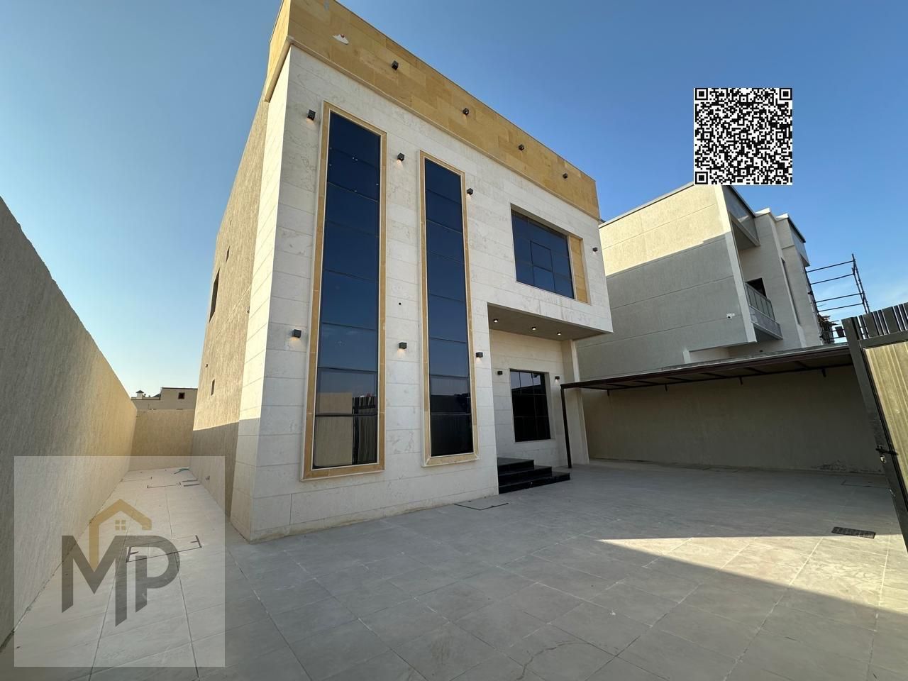 For sale villa - two floors & a large yard - close to Sheikh Mohammed bin Zayed Street - free ownership for all nationalities for life - with the possibility of easy bank financing