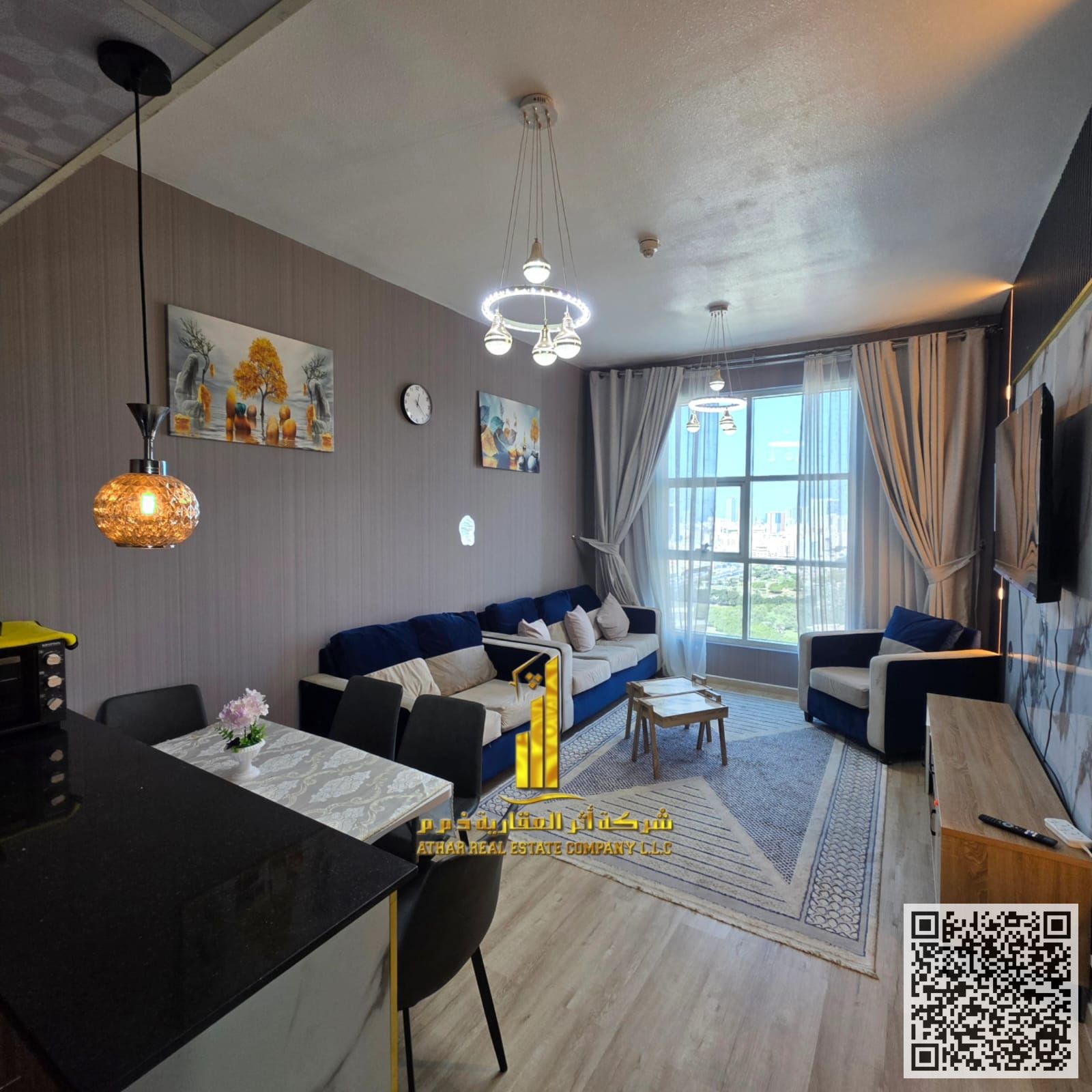 With an open view, a furnished one-bedroom apartment for monthly rent in Ajman, Khalifa Street, City Towers Includes bills, internet, and parking