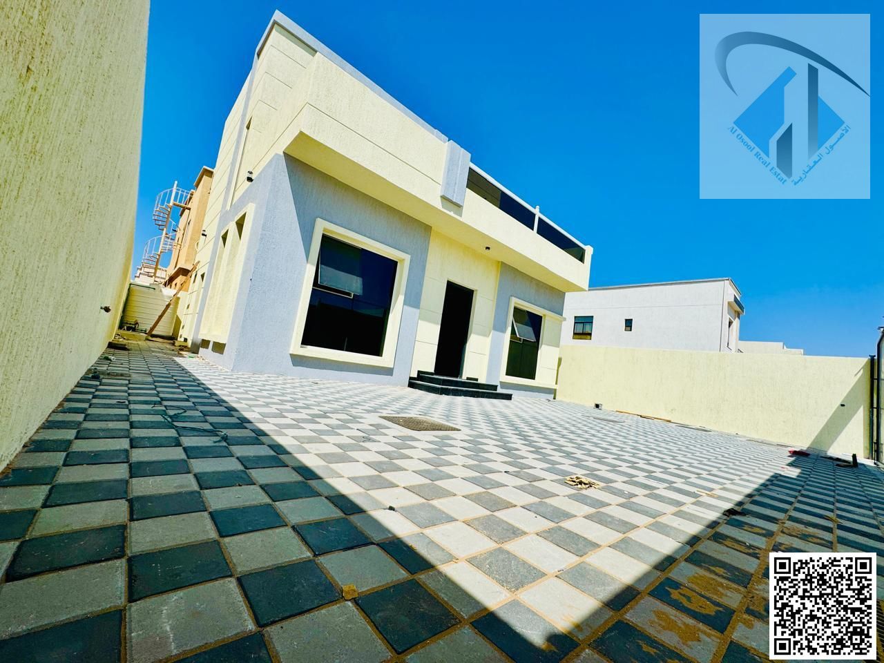 Villa for sale, freehold, open to all nationalities, near Sheikh Mohammed Bin Zayed Road, including registration and ownership fees.