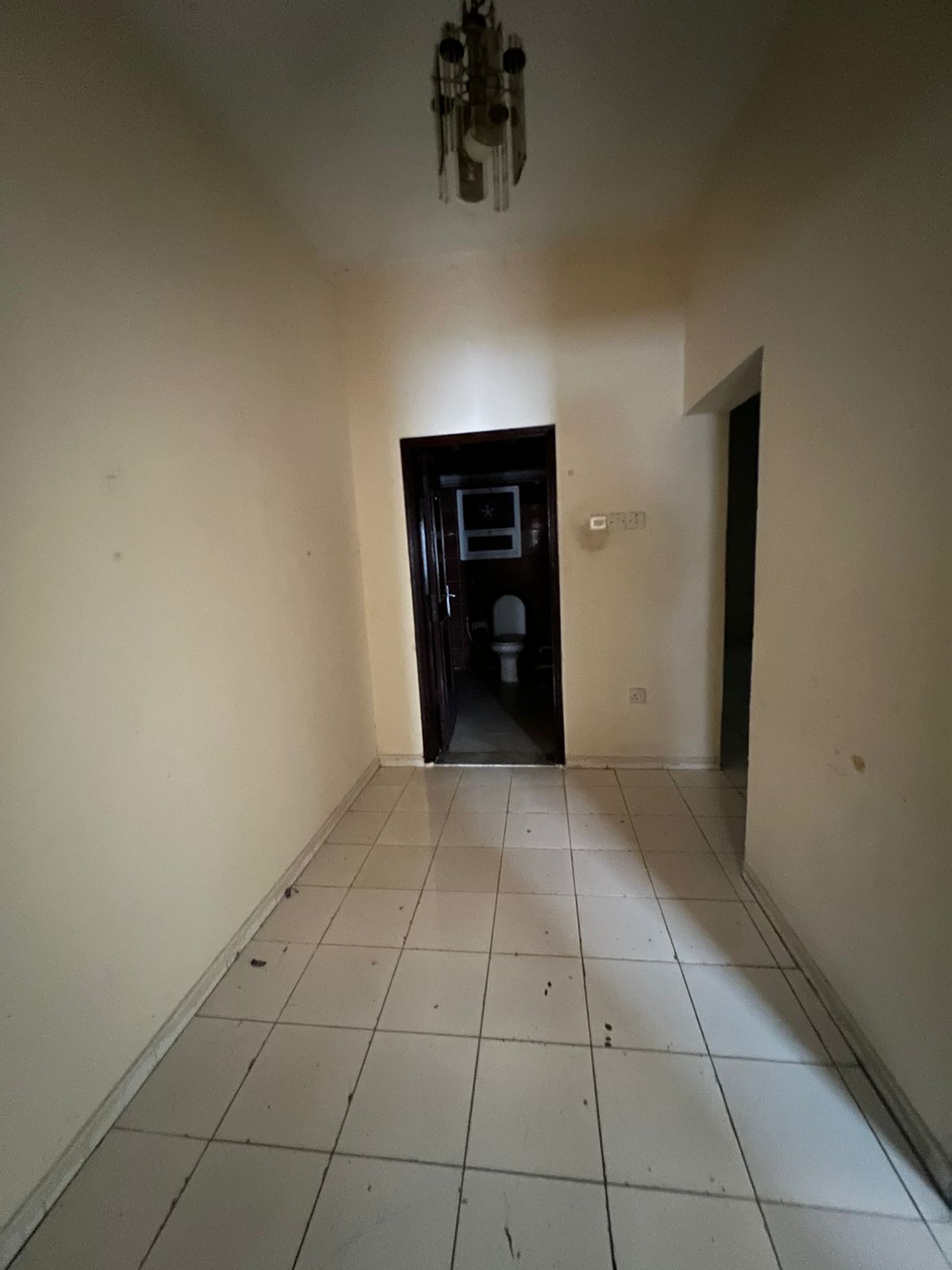 One bedroom and living room with a balcony