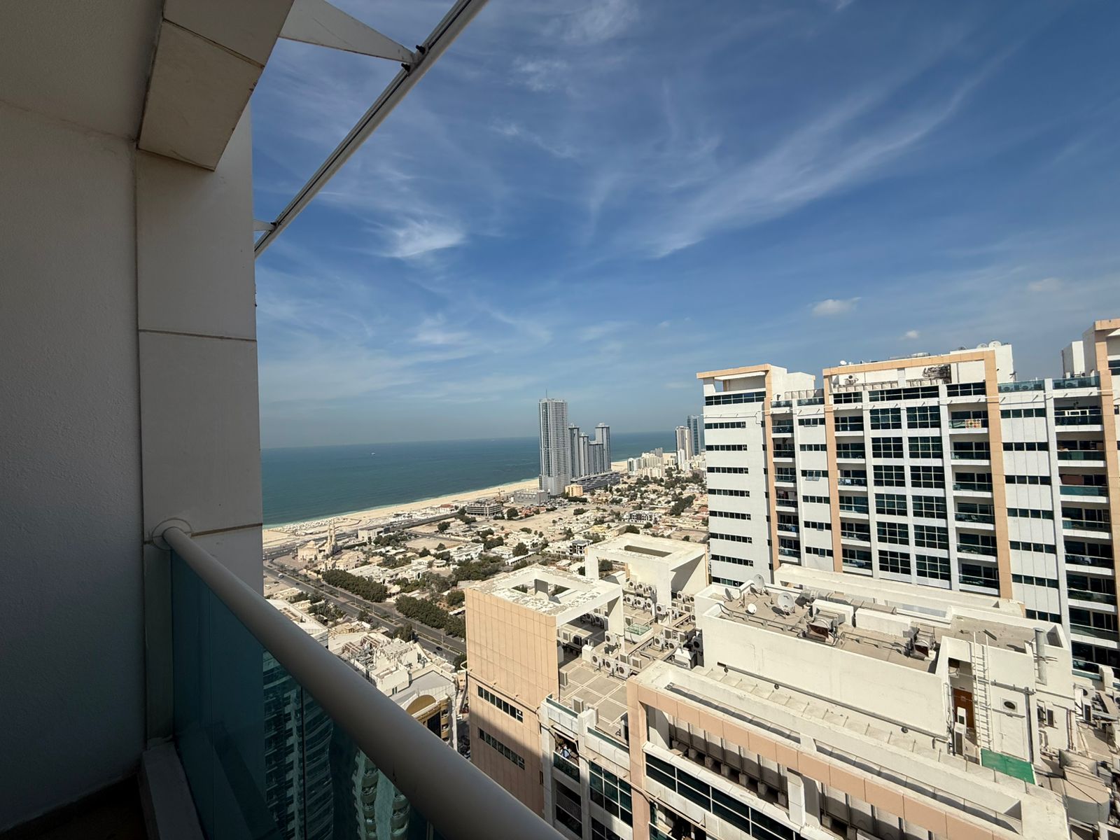 Two bedrooms and a living room for sale in Ajman Towers One with an open view of the Ajman Corniche
